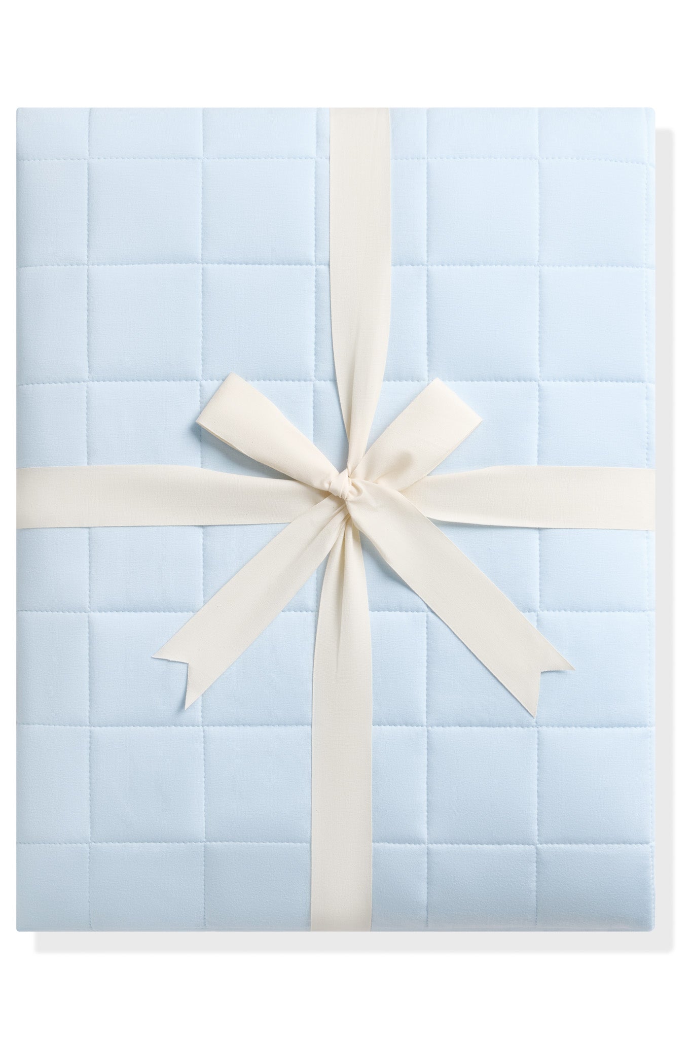 Product photo of the Adult Quilted Blanket in Breeze 2.5 shown tied in its linen ribbon