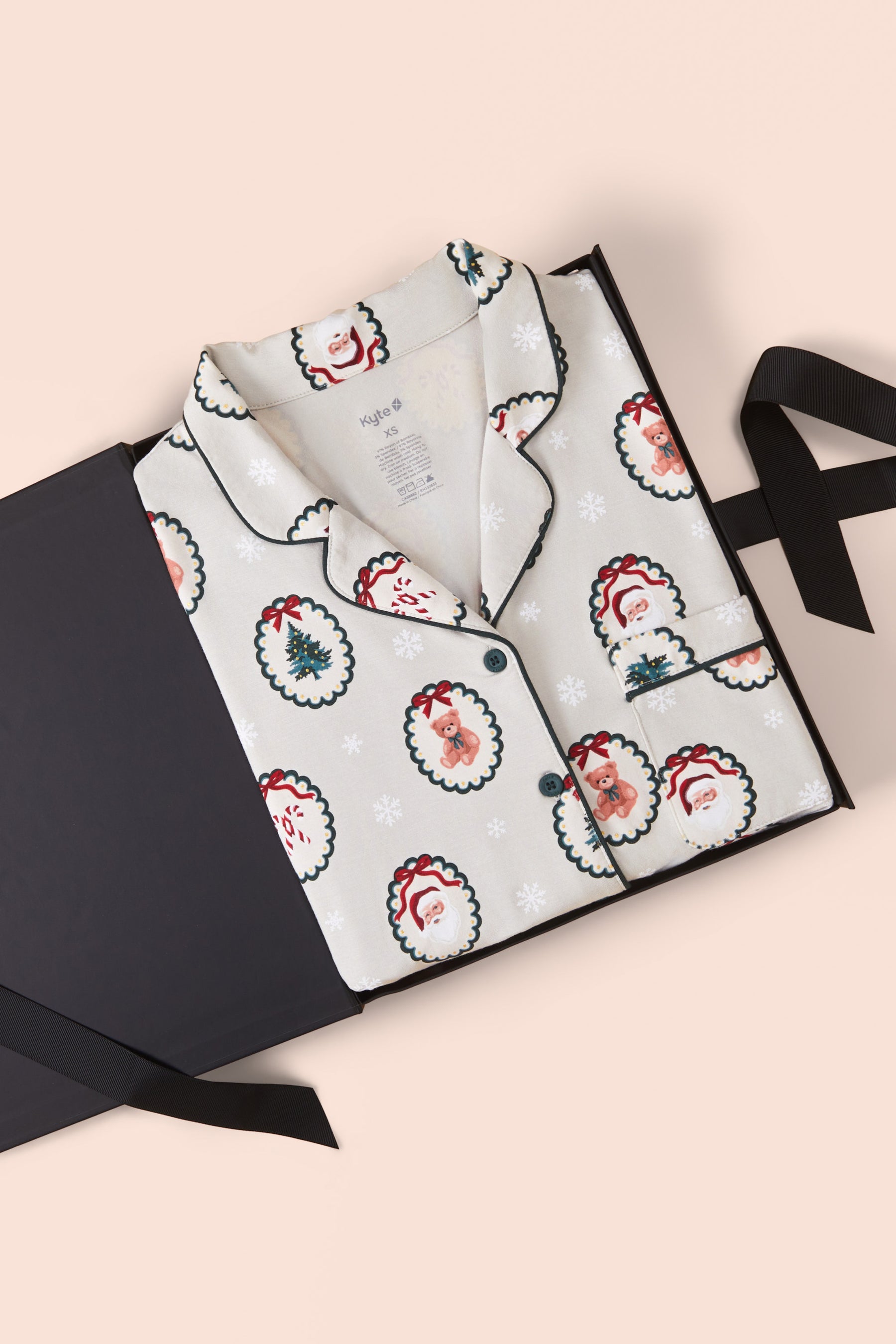 Long-Sleeved Women's Pajama Set in Holiday Medallion on a beige background