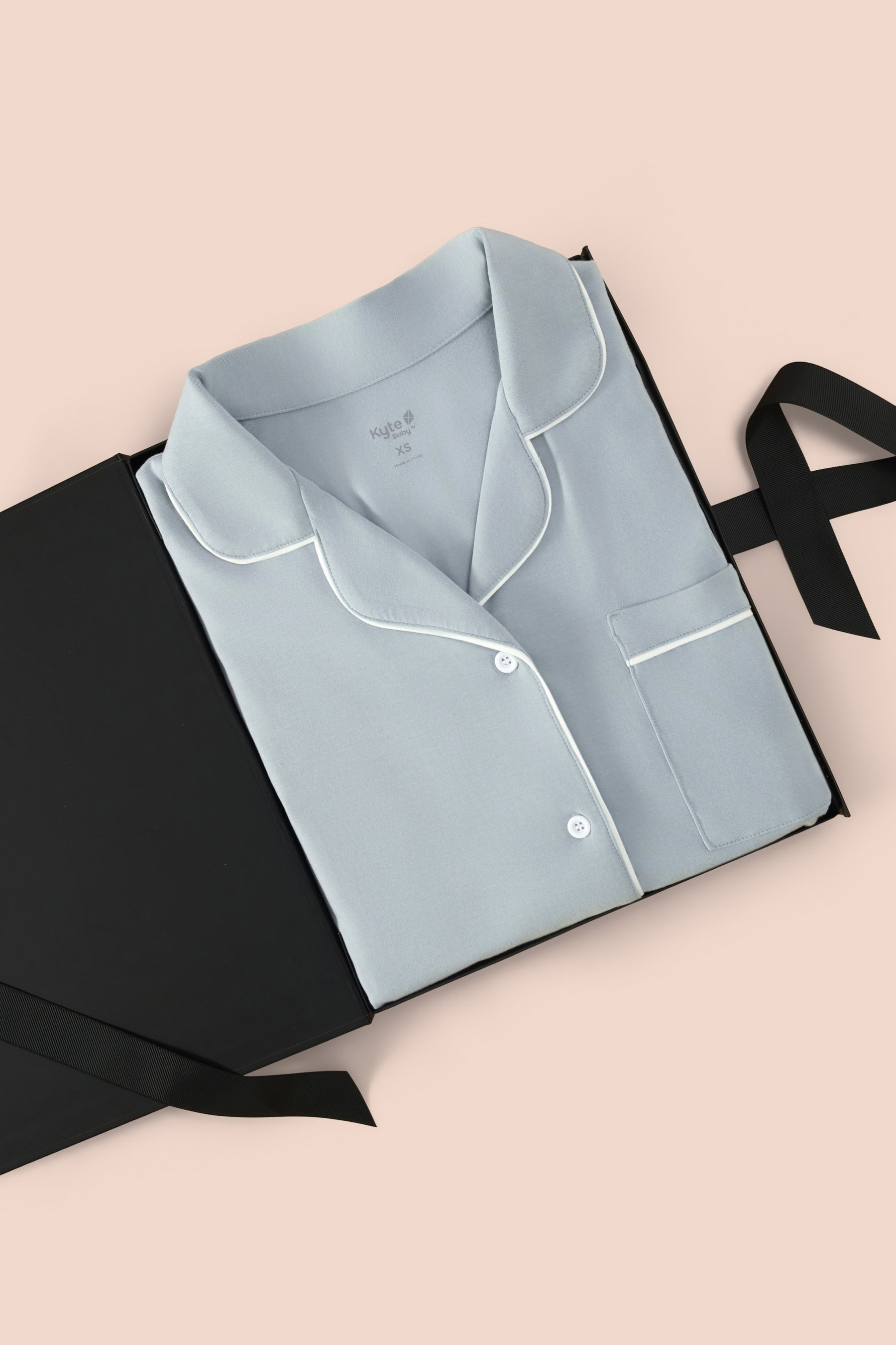 Women’s Short Sleeve Pajama Set in Fog with Cloud Trim packed in a box on a beige background