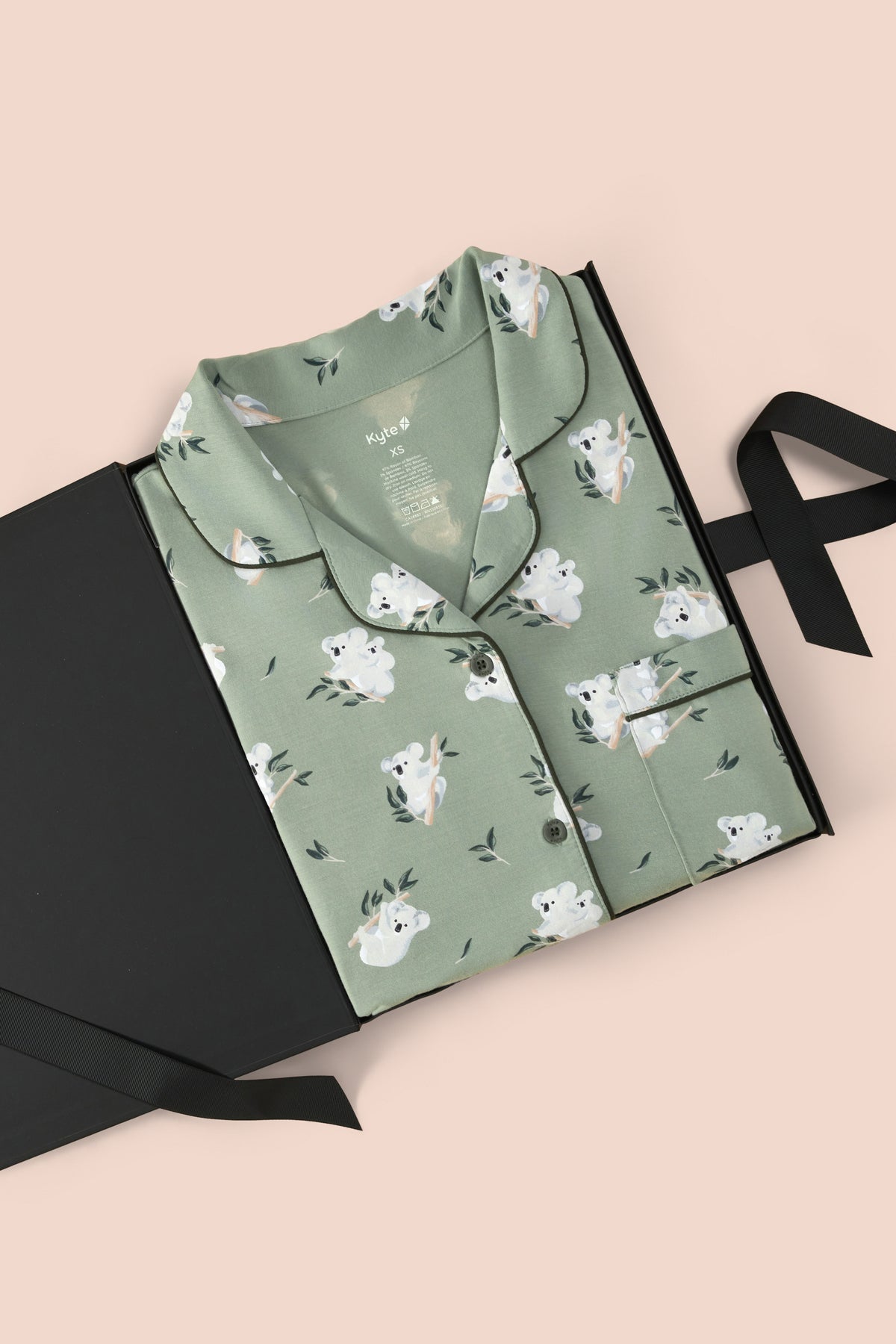 Women's Short Sleeve Pajama Set in Koala packed in a box on a beige background