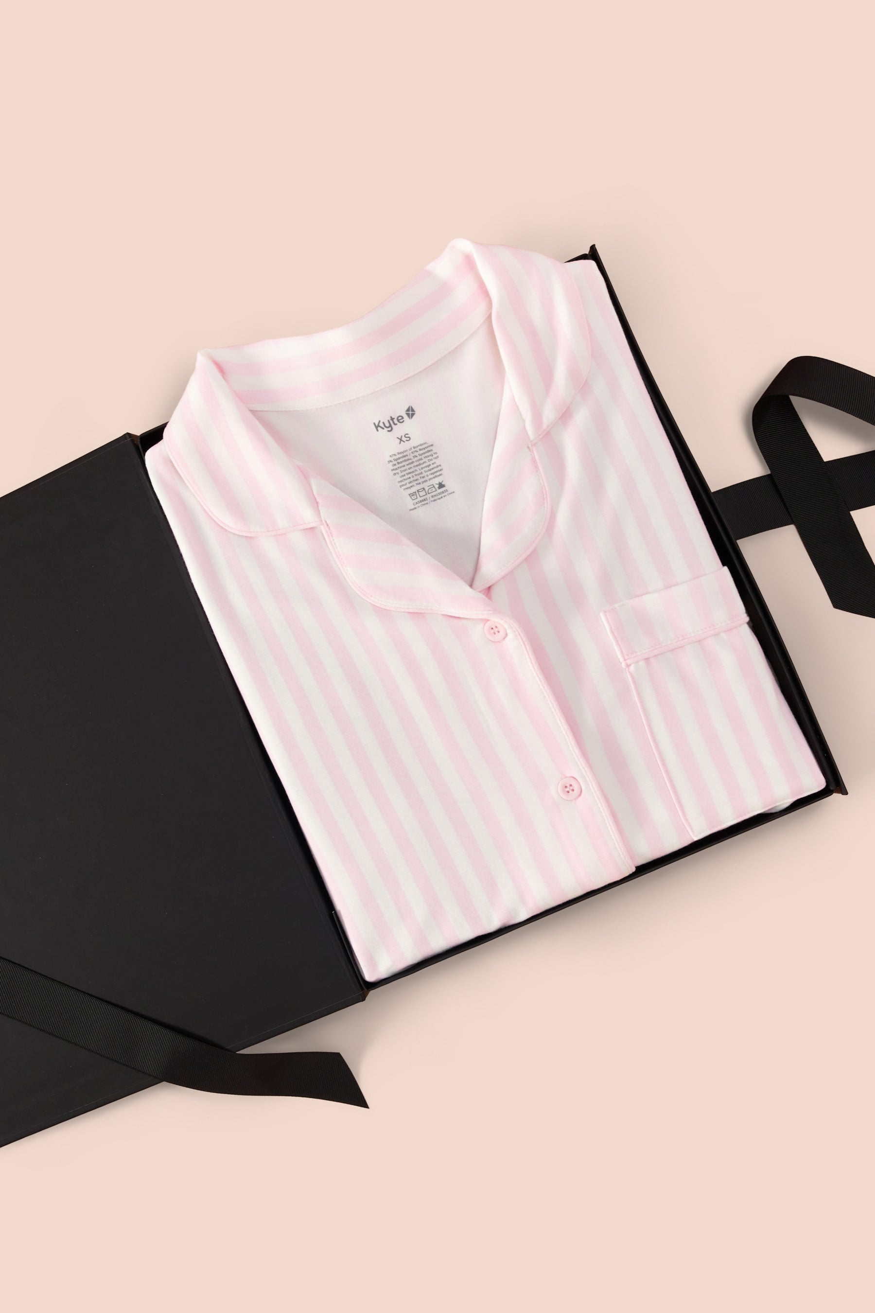 Women's Short Sleeve Pajama Set in Small Sakura Stripe print packed in a box on a beige background