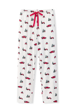 White pajama pants with an all-over red and black holiday truck and pine tree print, featuring a red drawstring waist.