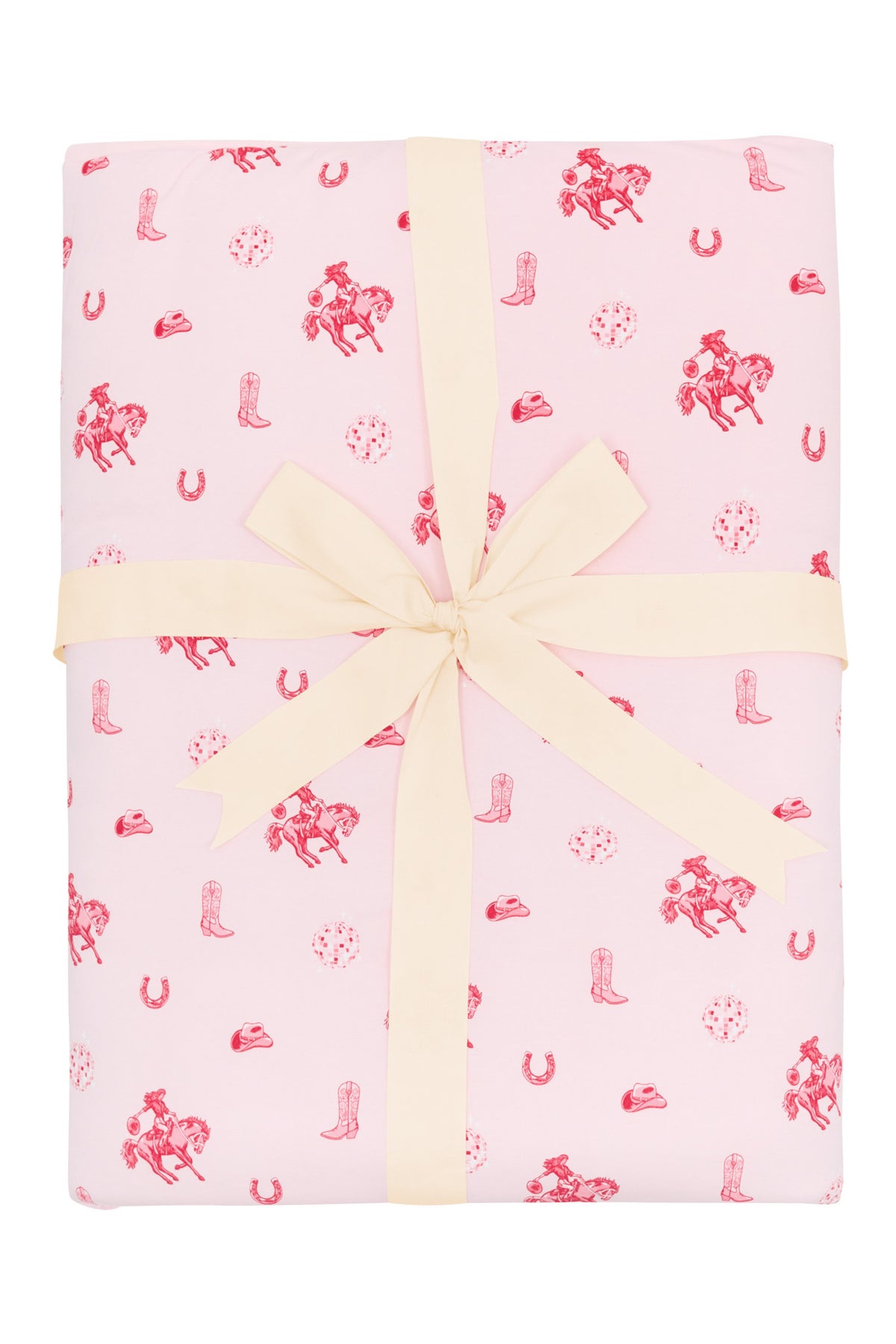 Youth Blanket in Disco Cowgirl 2.5 shown wrapped in its packaging with a linen bow