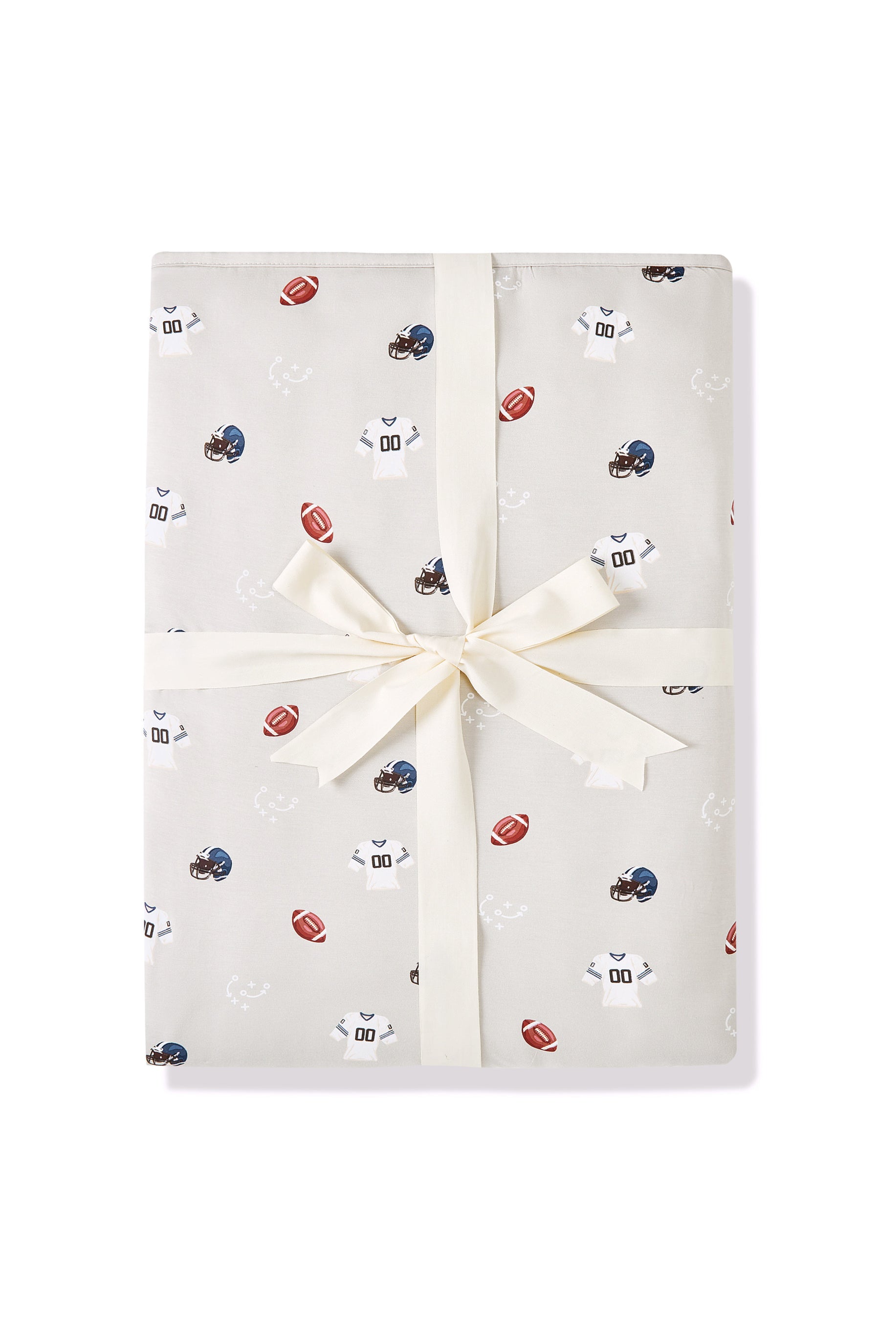 Youth Blanket in Vintage Football 2.5 print packed in a ribbon on a white background