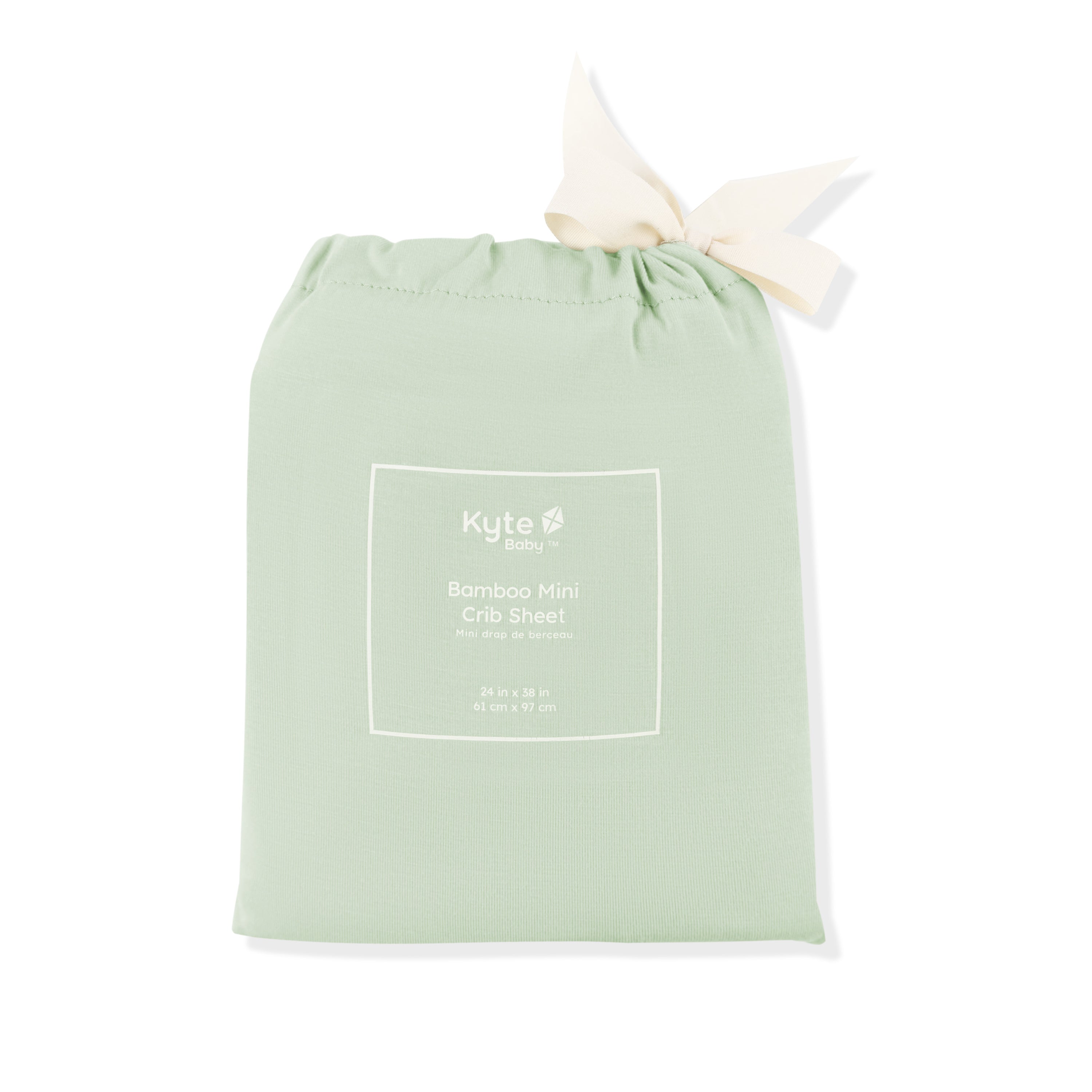 Mini Crib Sheet in Basil shown in its packaging