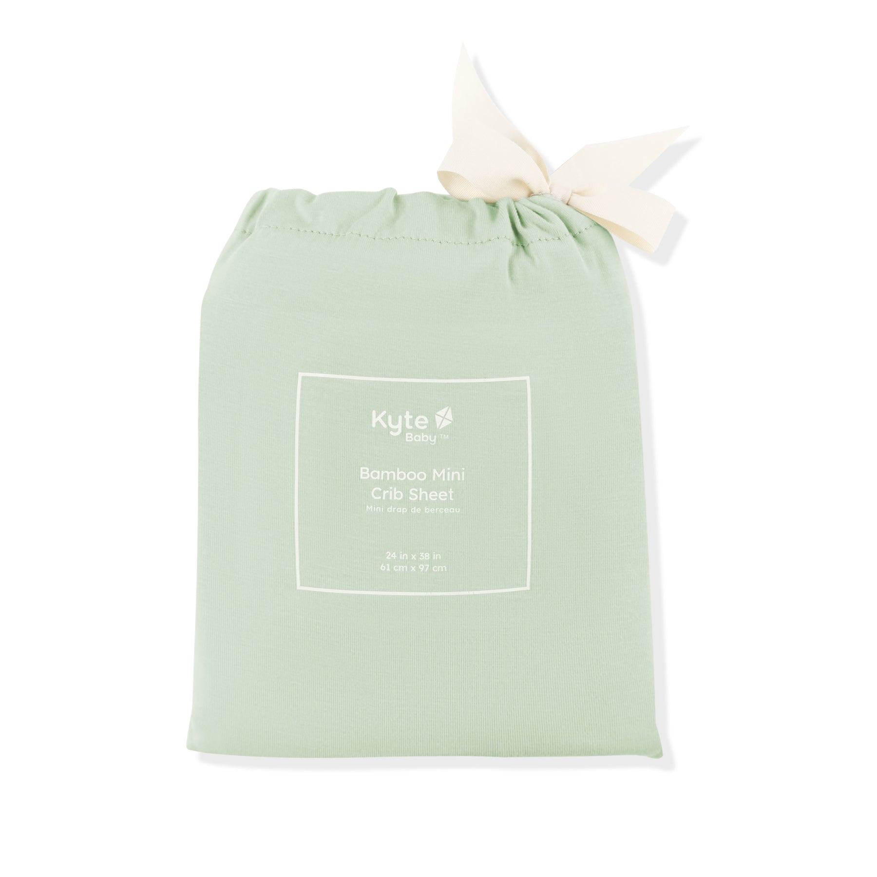 Mini Crib Sheet in Basil shown in its packaging