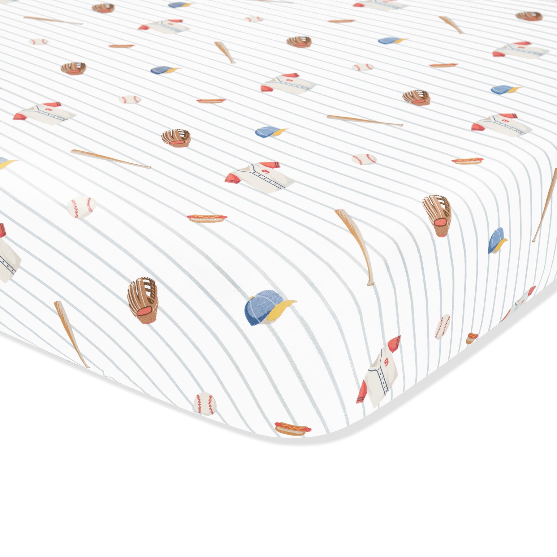 Corner of the Mini Crib Sheet in Home Run shown on a crib mattress