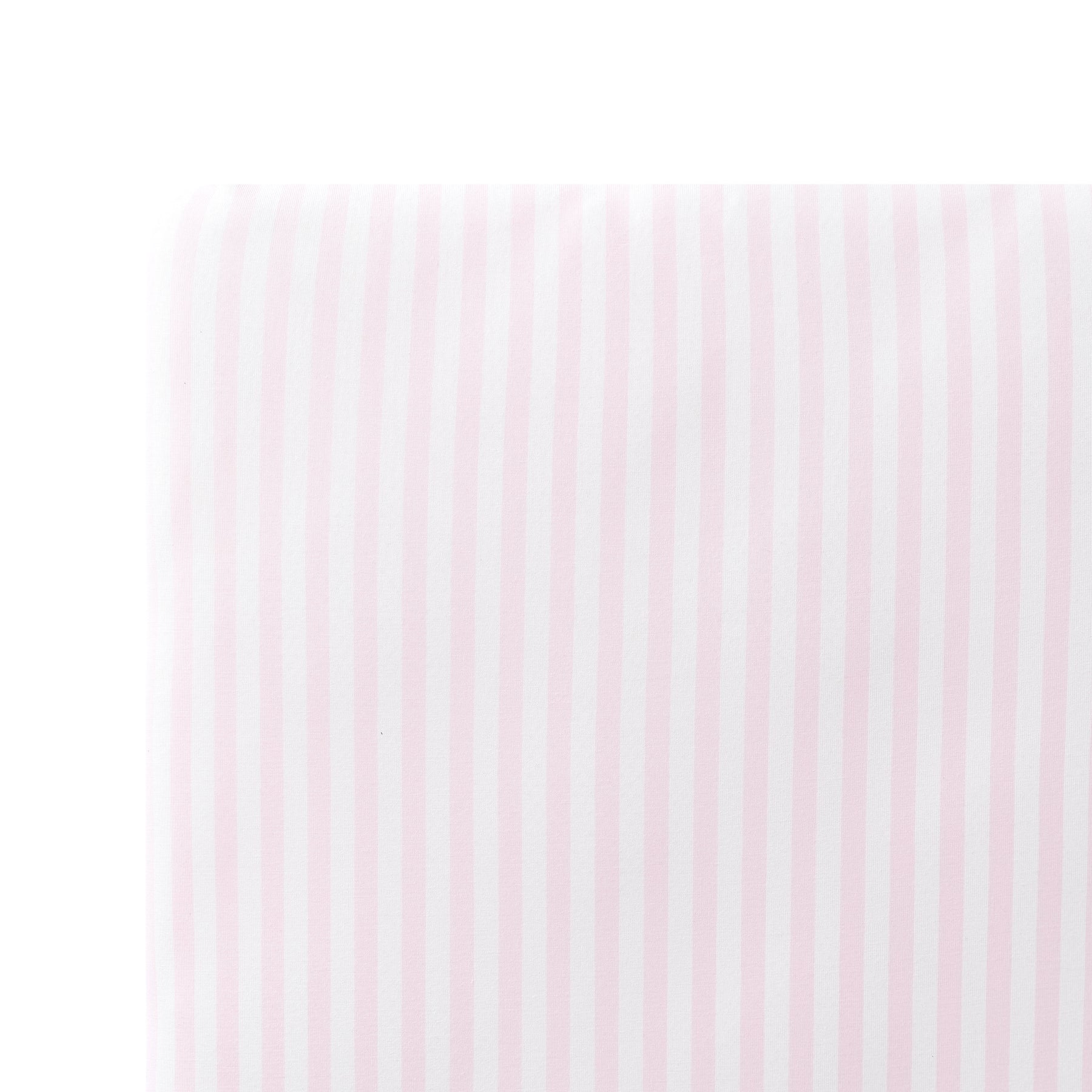 Close up of the Mini Crib Sheet in Small Sakura Stripe on a mattress