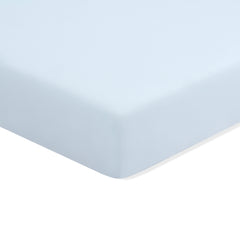 Mini Crib Sheet in Breeze shown on a mattress