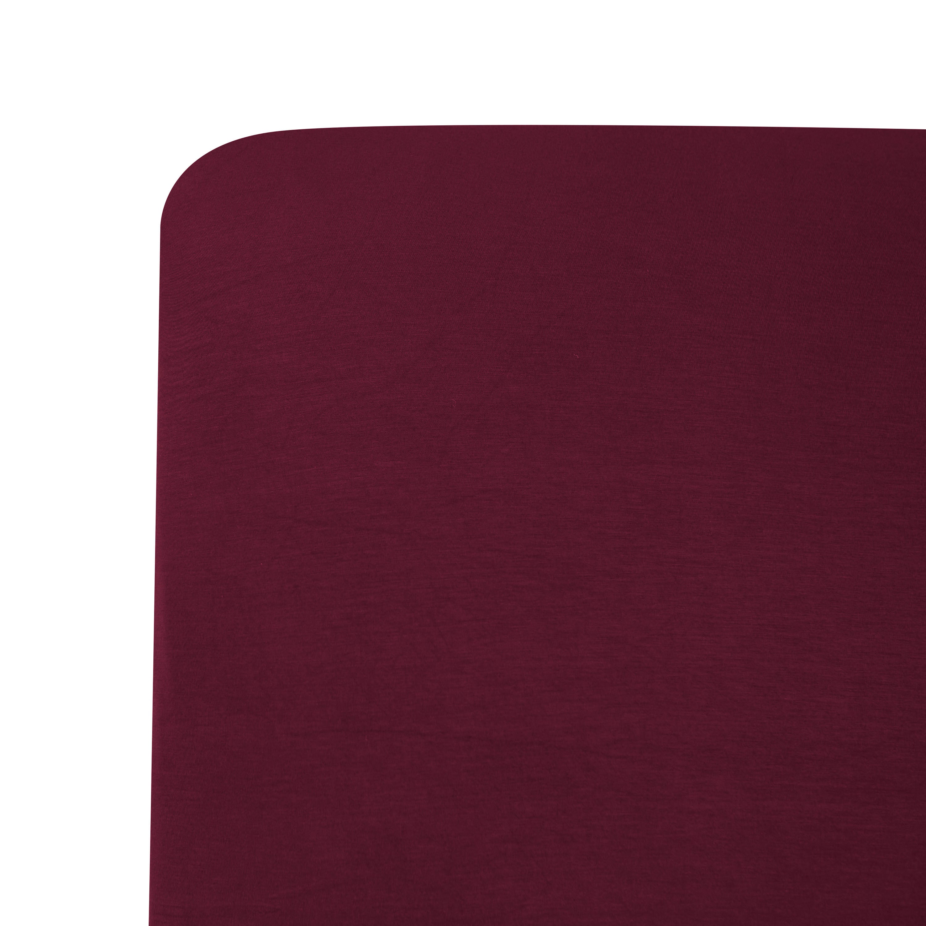 Close up of a corner on the Crib Sheet in Burgundy