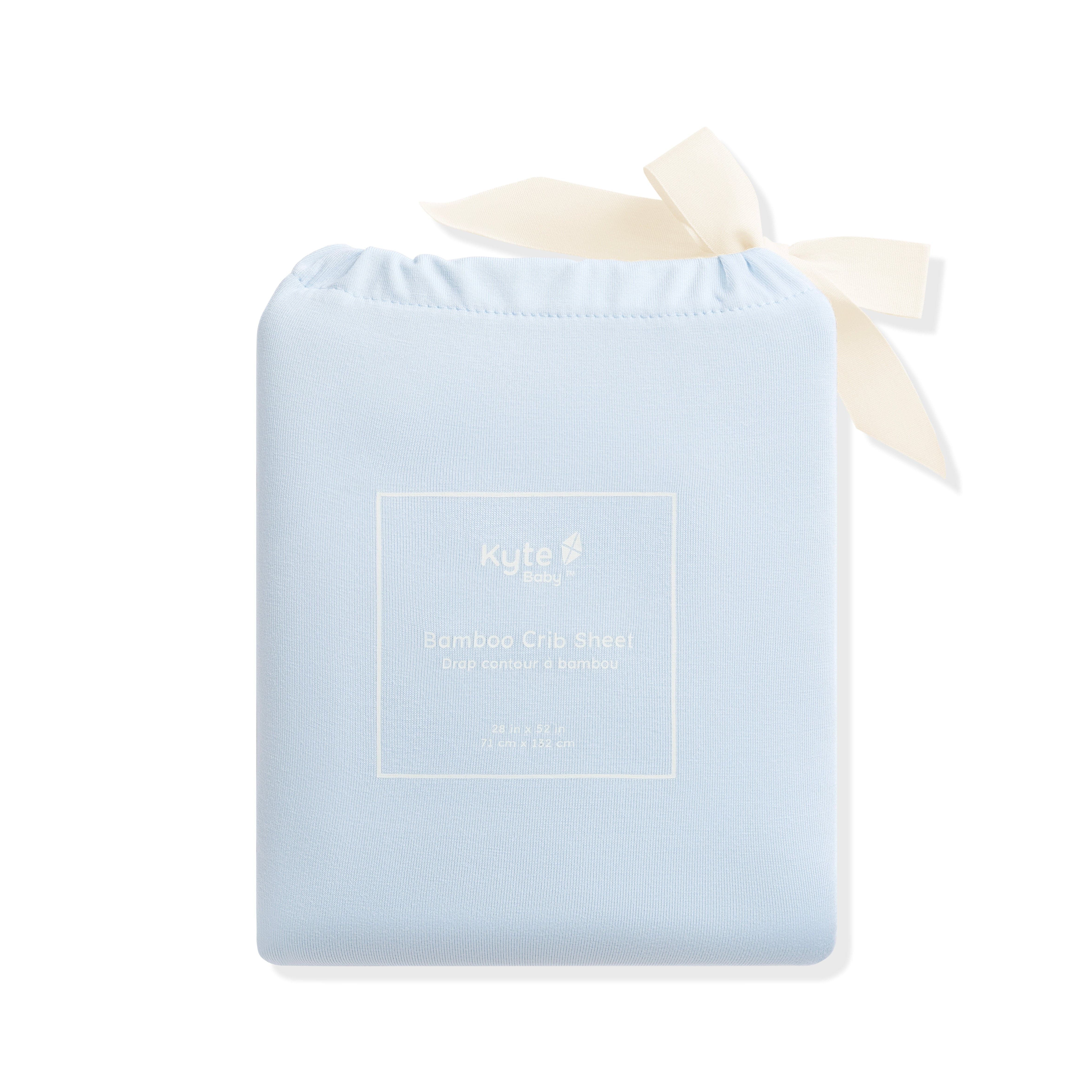 Crib Sheet in Breeze shown in its packaging