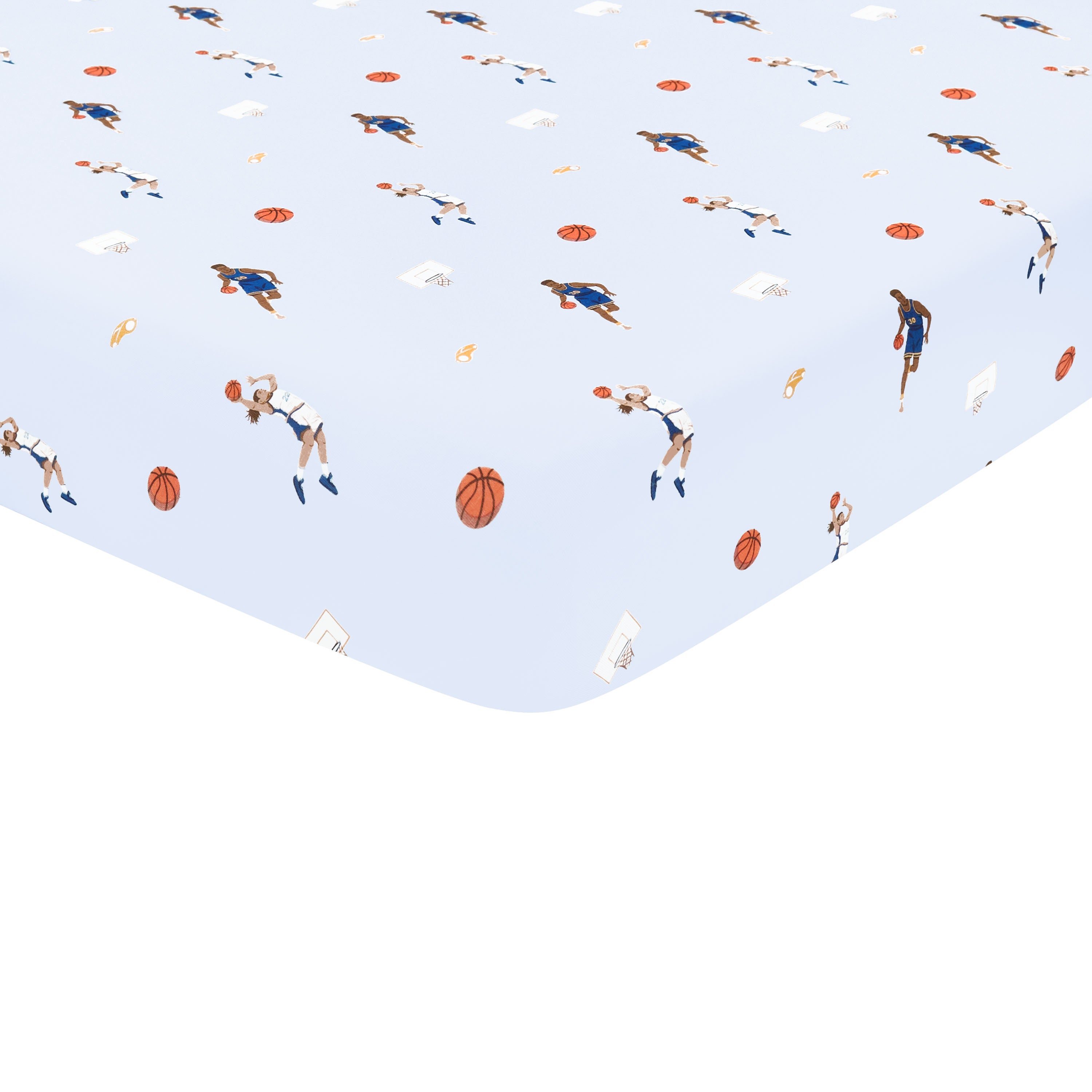 Corner of the Crib Sheet in Basketball shown on a crib mattress