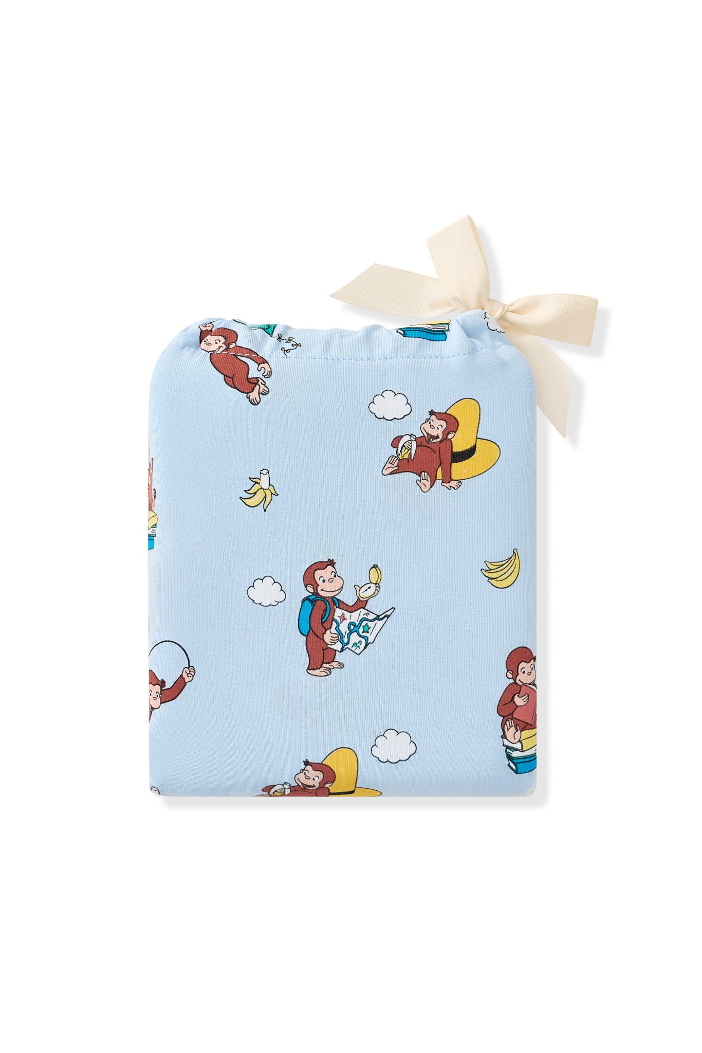 Crib Sheet packed in a blue bag with Curious George 2.5 print it on a white background