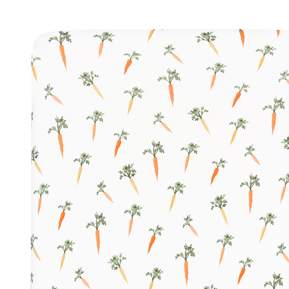 Close up of the Crib Sheet in Carrot on a mattress