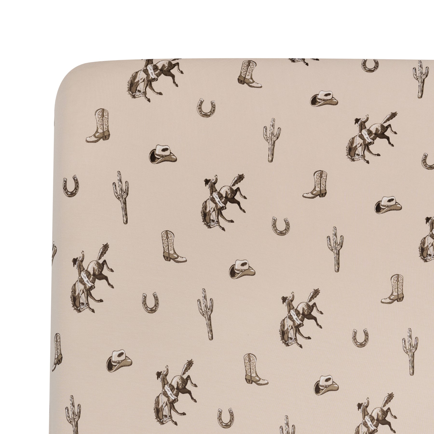 Close up of the Crib Sheet in Classic Cowboy on a crib mattress