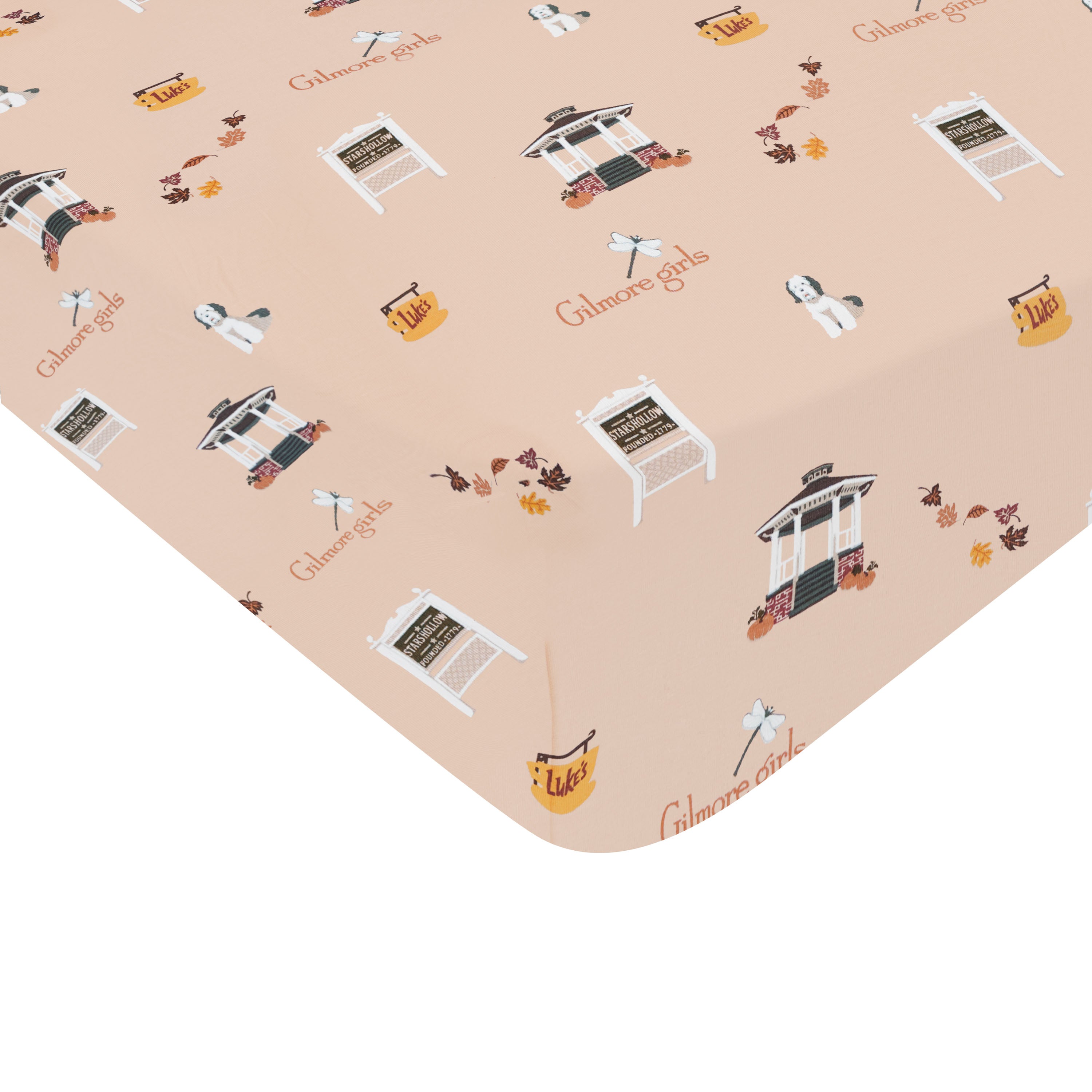 Patterned fabric with 'Gilmore Girls' logo and characters on a beige background