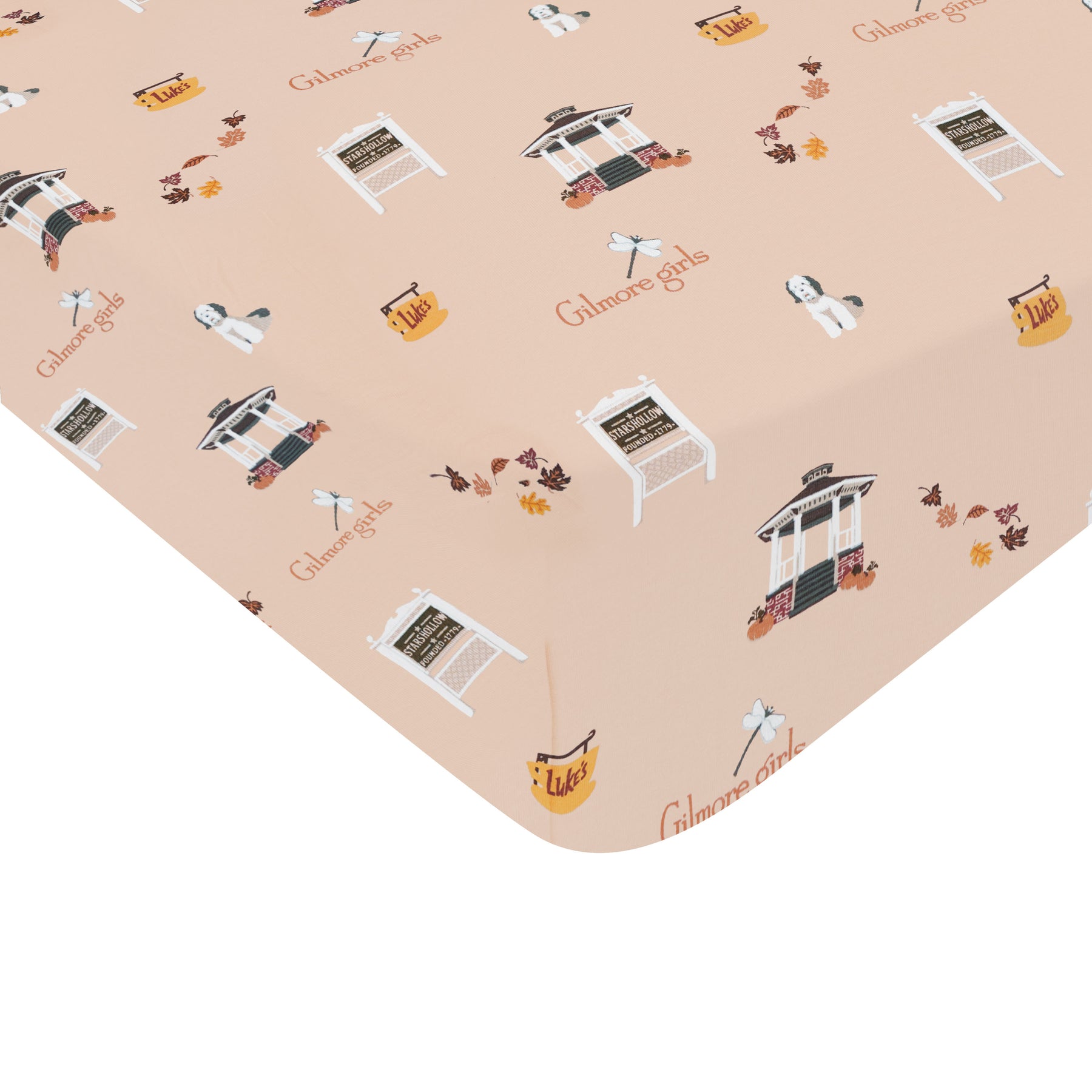 Patterned fabric with 'Gilmore Girls' logo and characters on a beige background