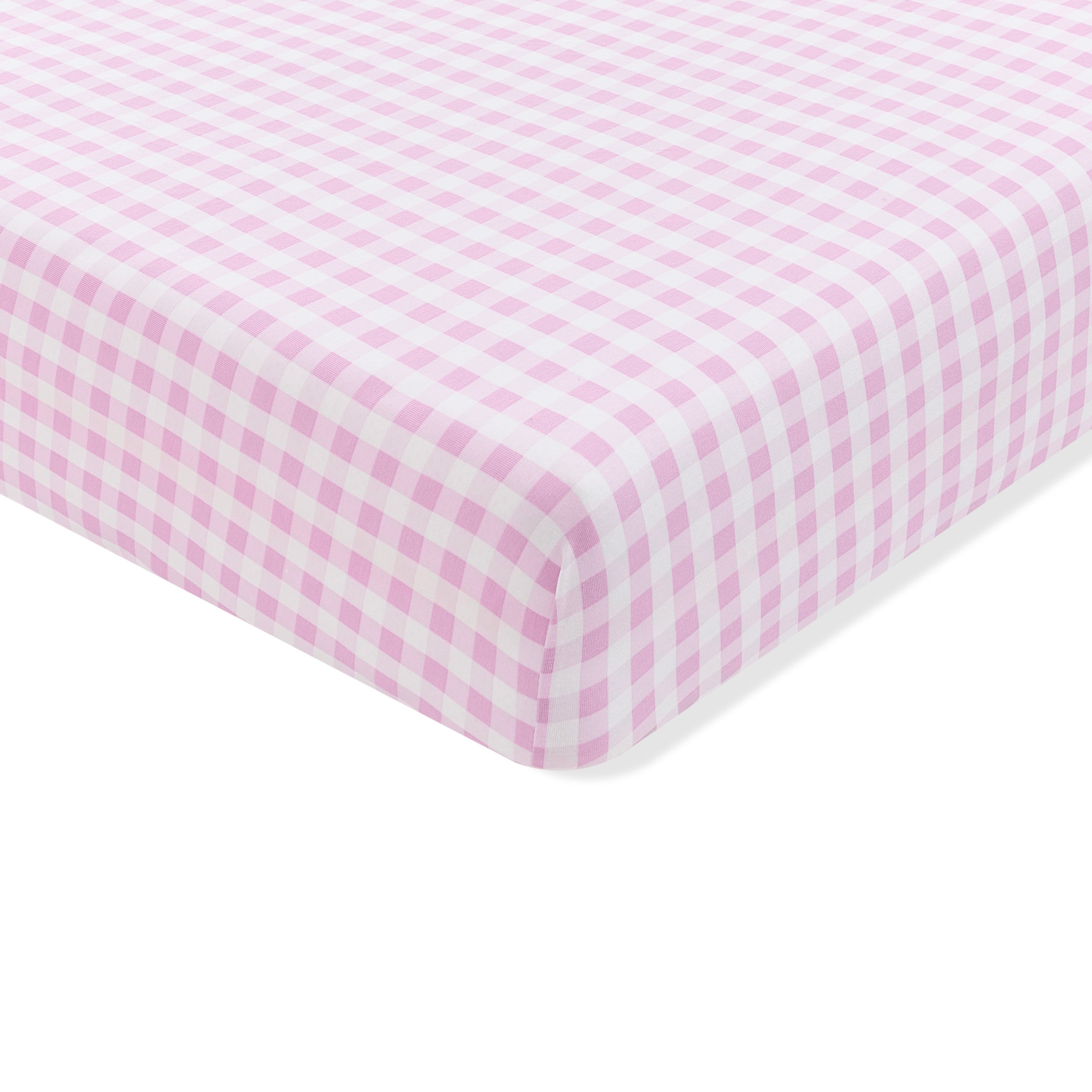 Corner of the Crib Sheet in Gingham Thistle on a crib mattress