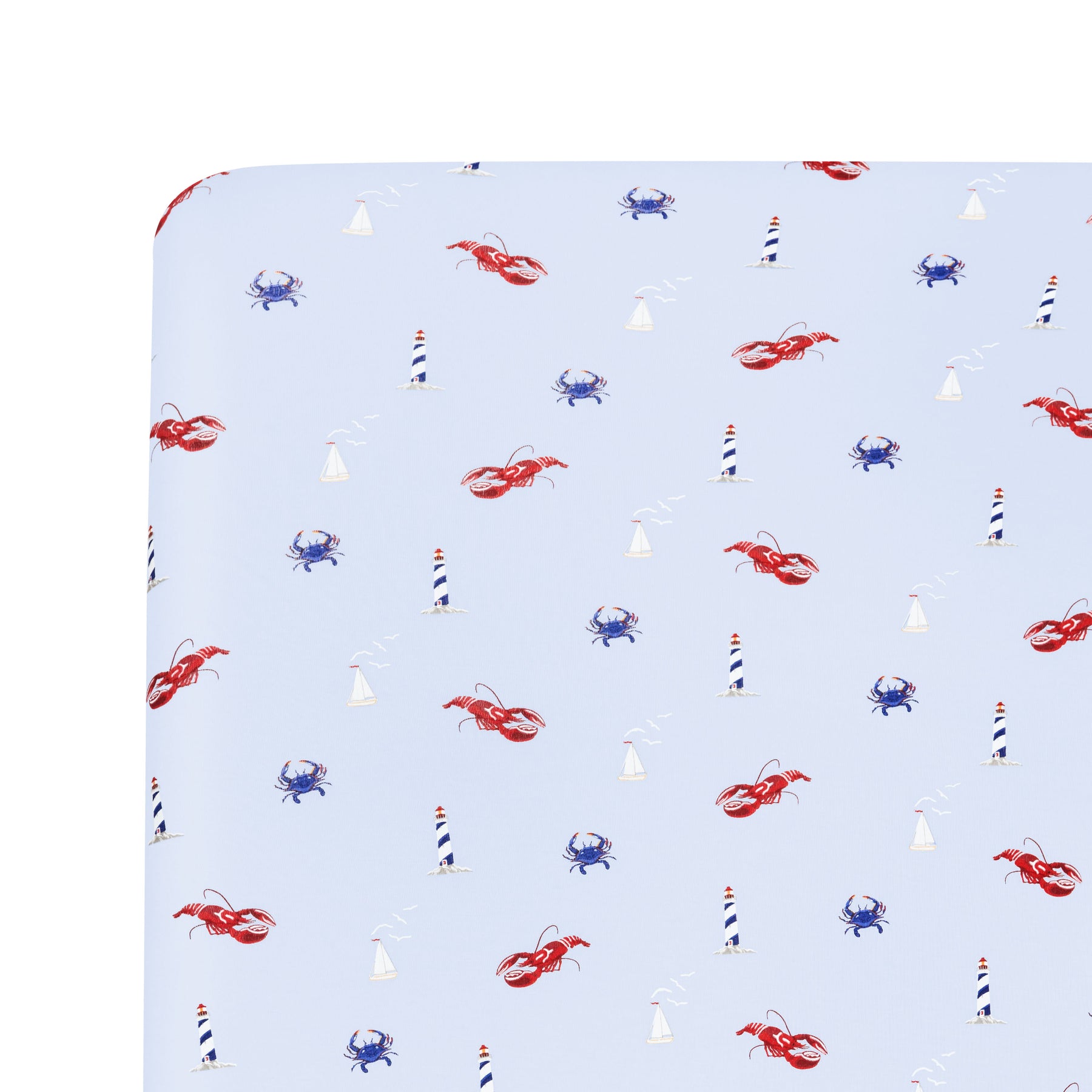 Close up of the Crib Sheet in Harbor shown on a mattress