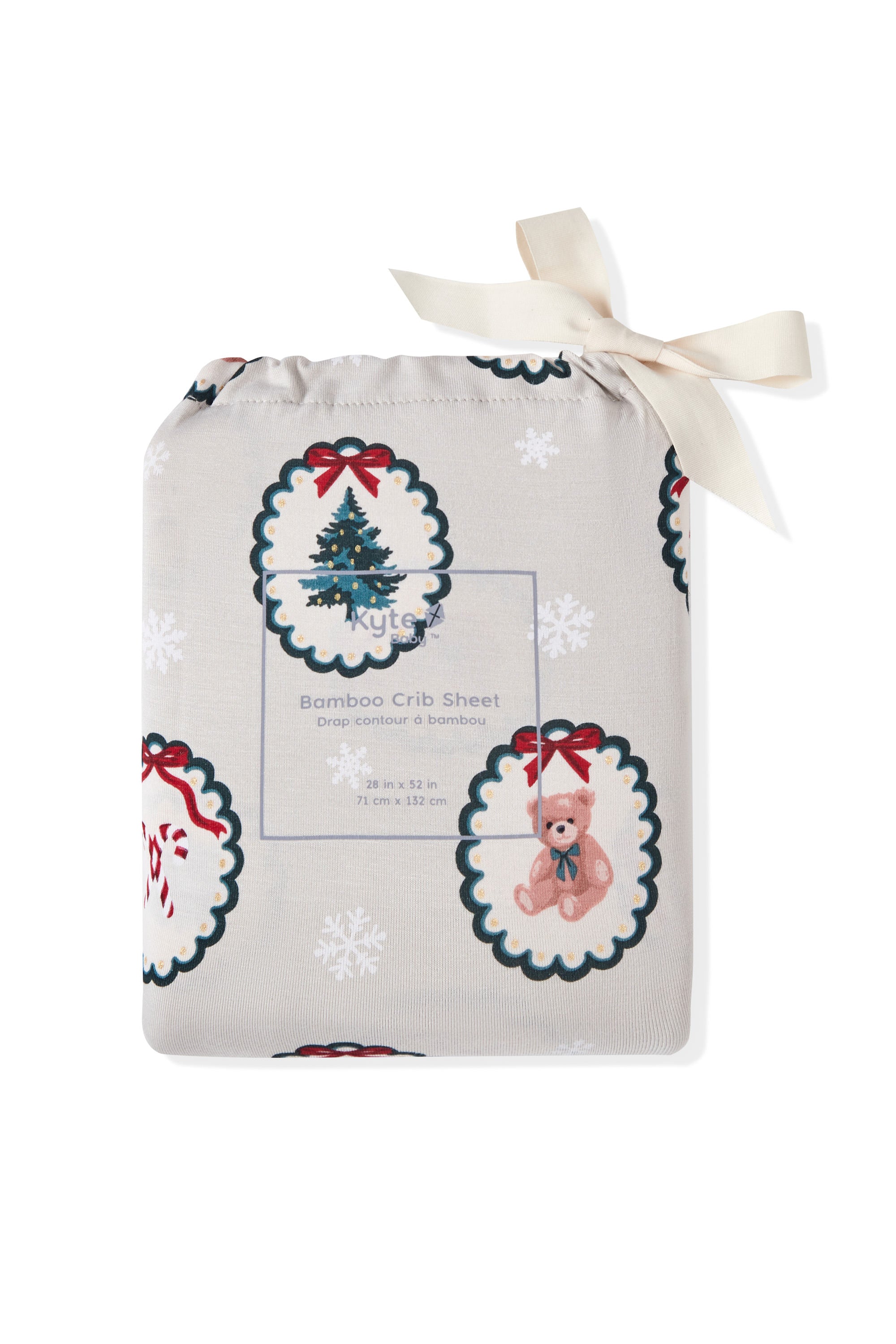 Crib Sheet packed in a bag with Holiday Medallion print on a white background