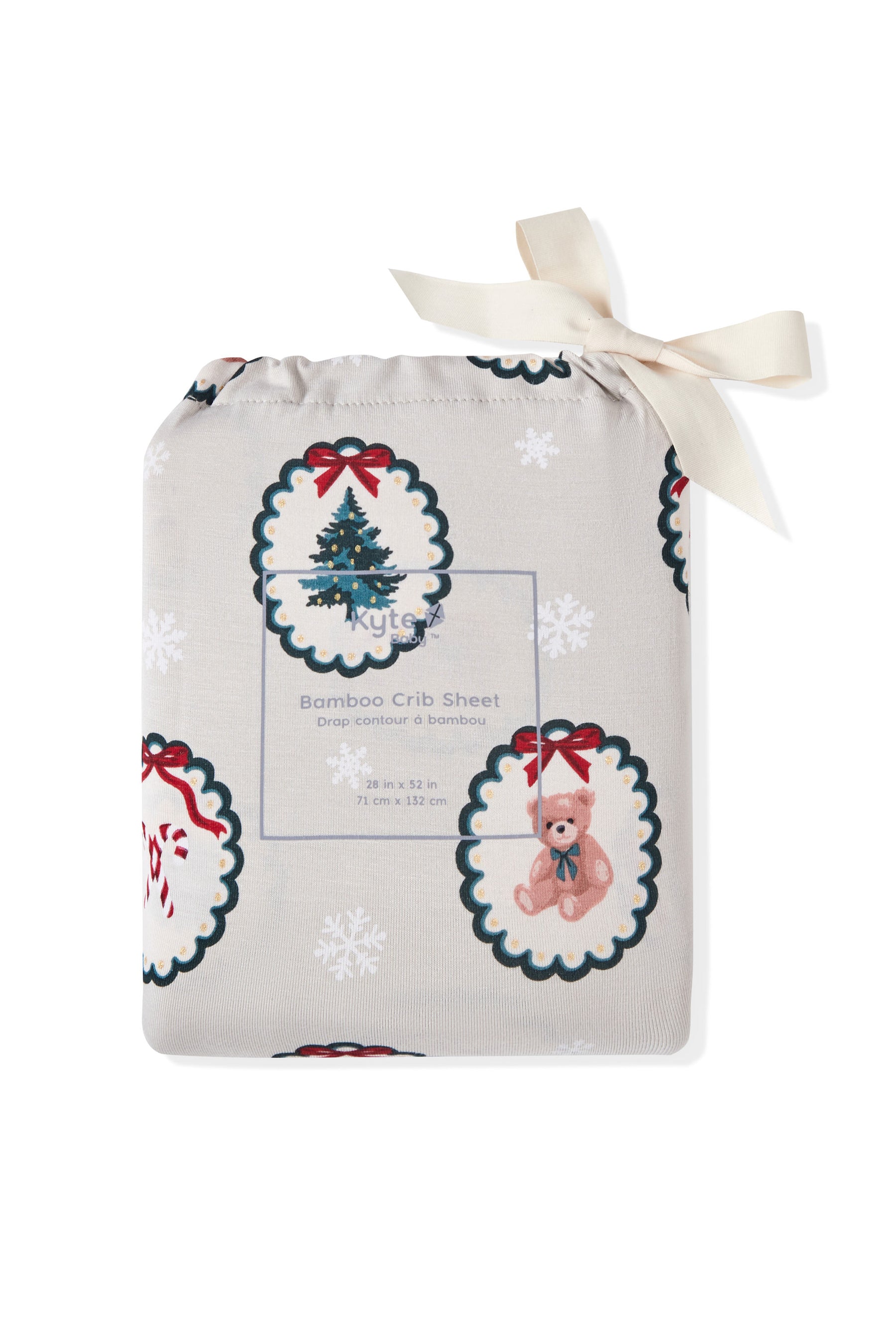 Crib Sheet packed in a bag with Holiday Medallion print on a white background