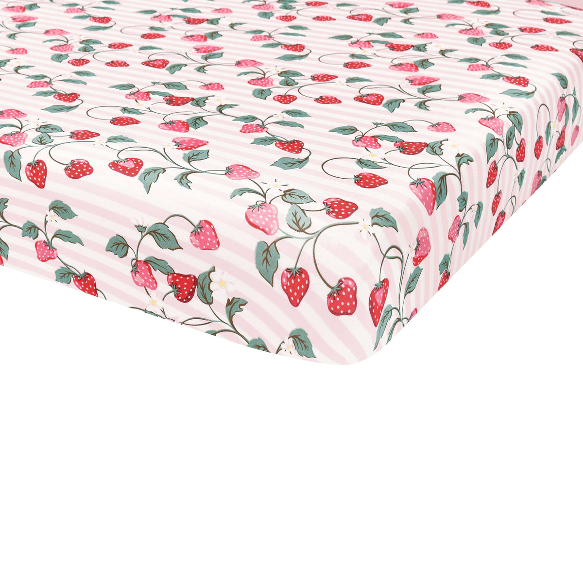 Corner of the Crib Sheet in Strawberry Fields shown on a crib mattress