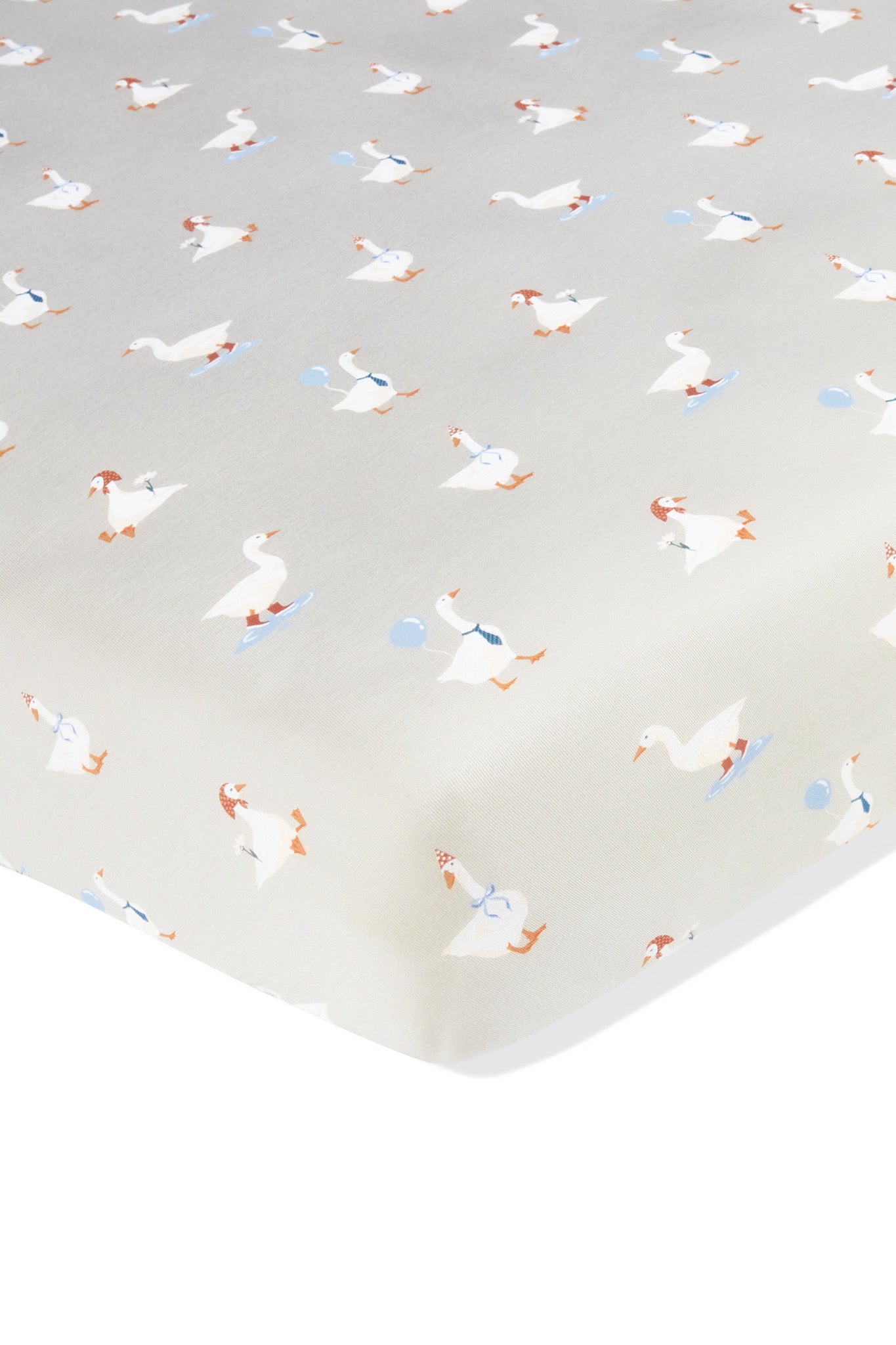 Crib Sheet in Oat Silly Goose print on a white background