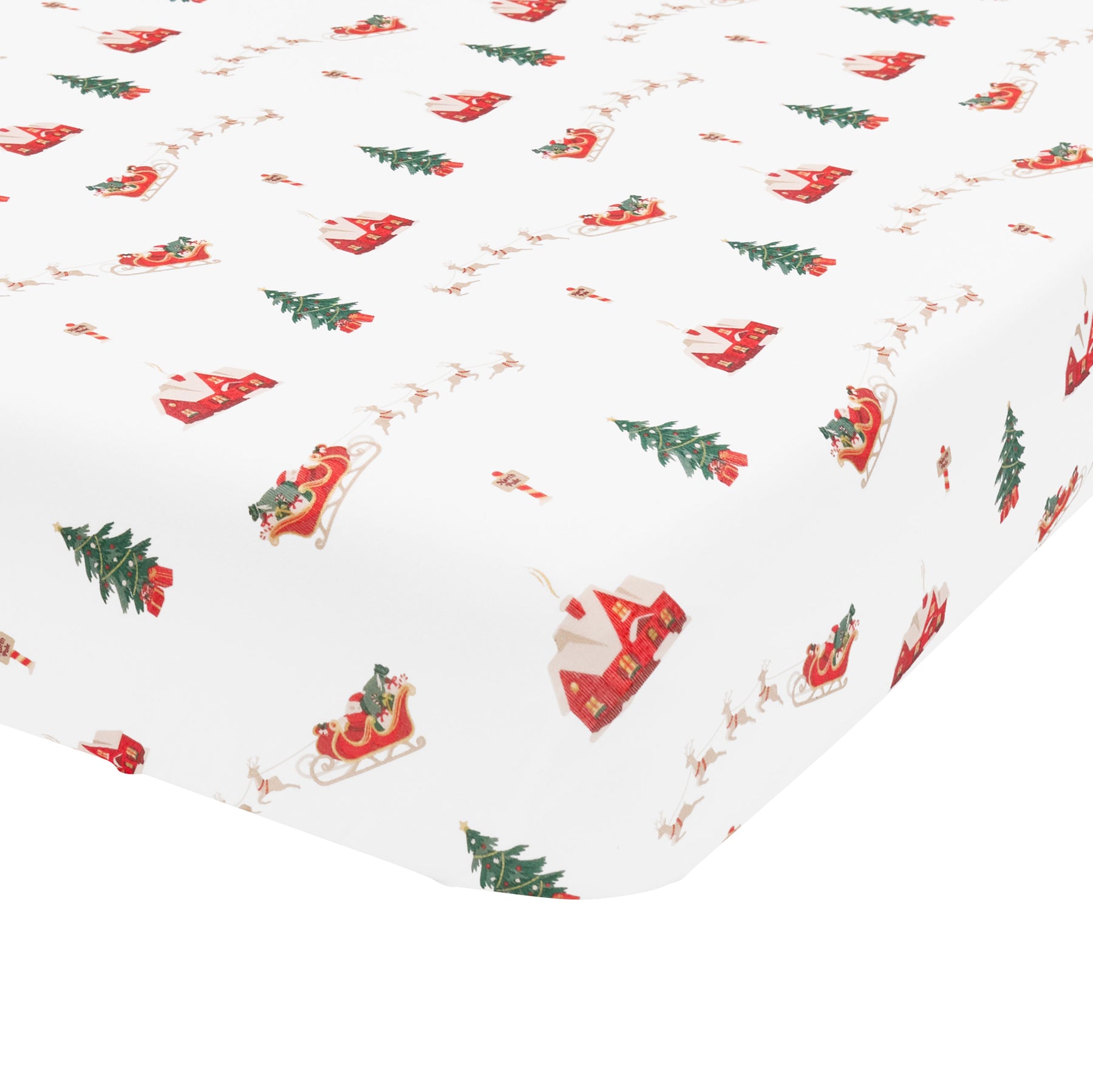 The corner of the Crib Sheet in Santa Sleigh shown on a mattress