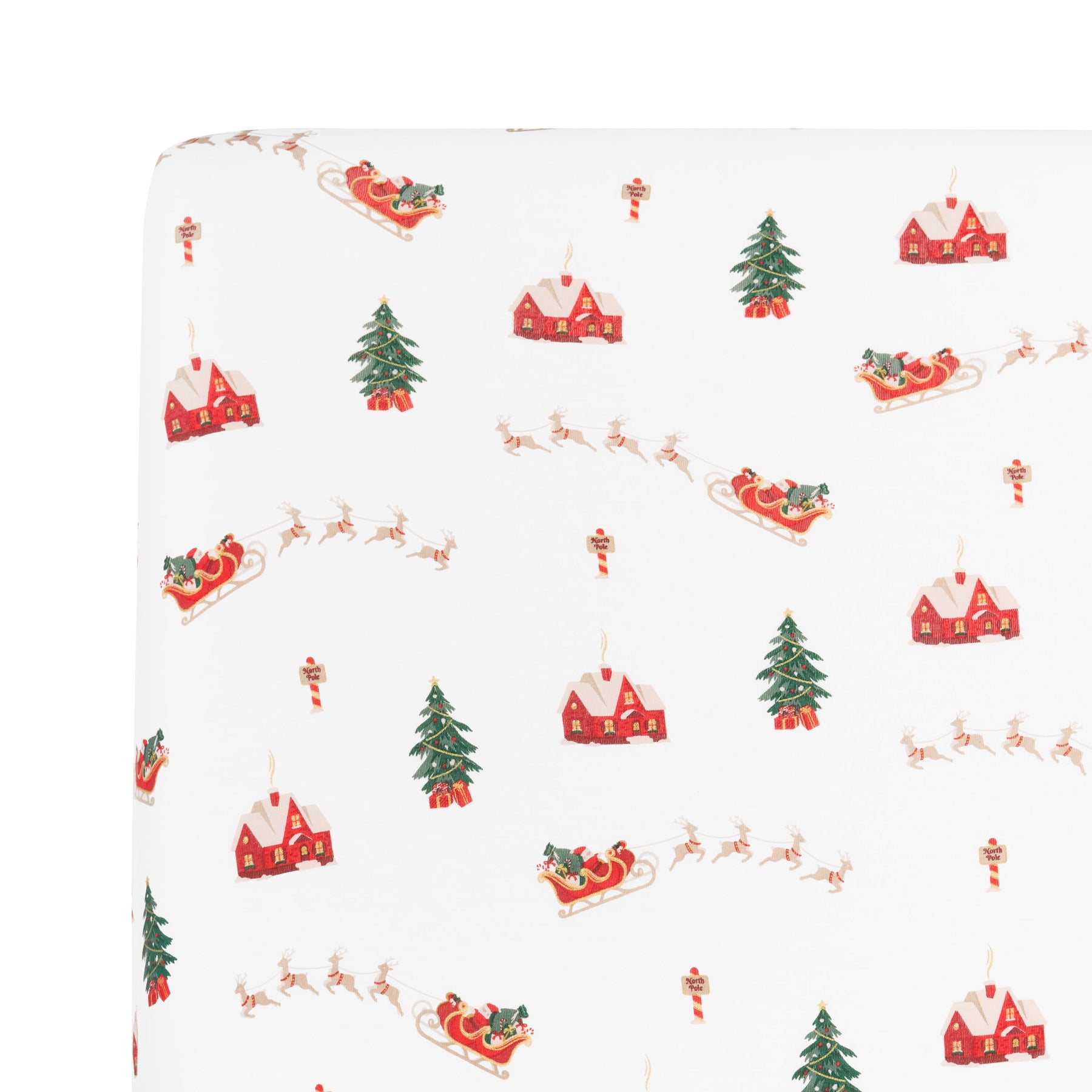 Close up of Crib Sheet in Santa Sleigh corner on a mattress