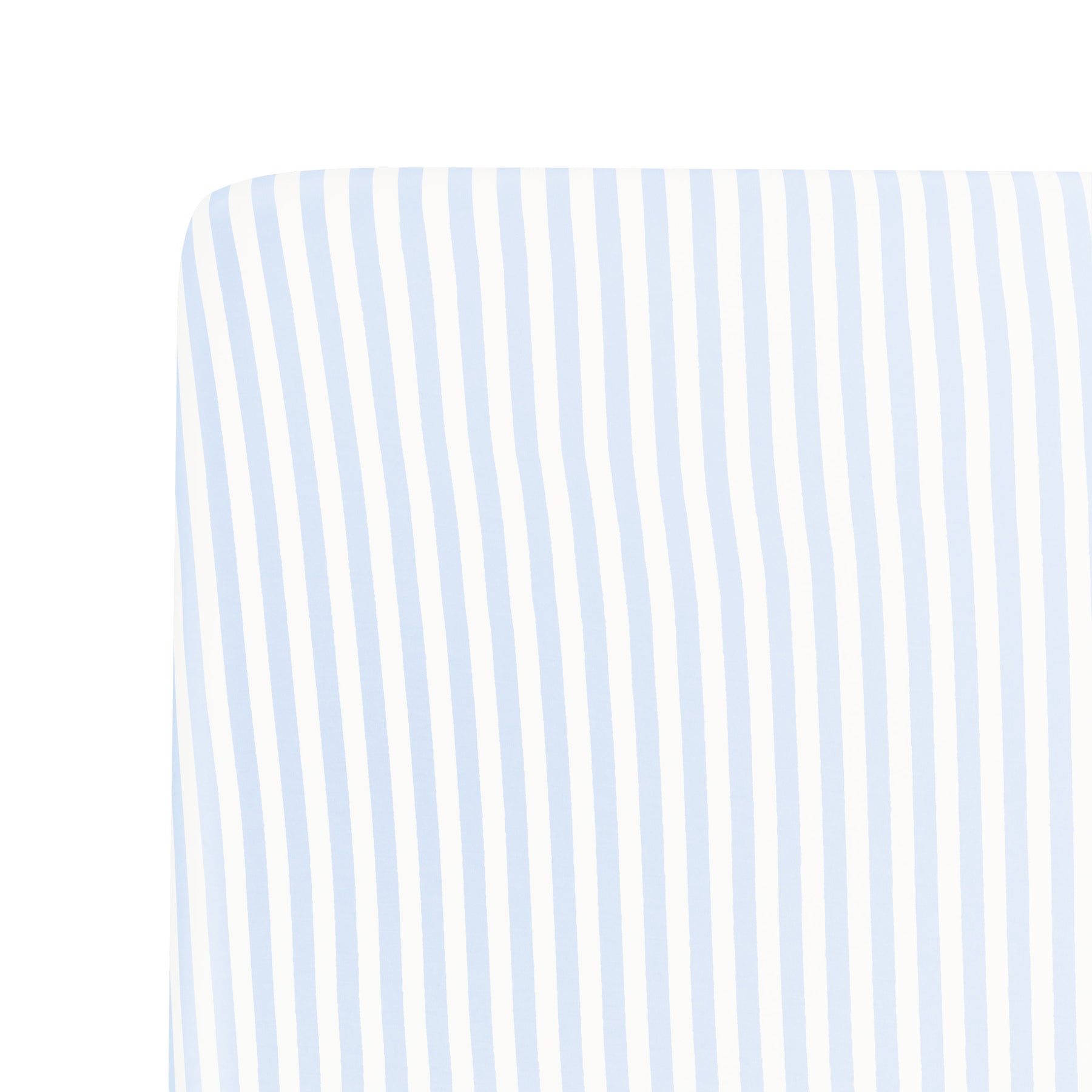 Close up of a corner of the Crib Sheet in Small Mist Stripe on a mattress