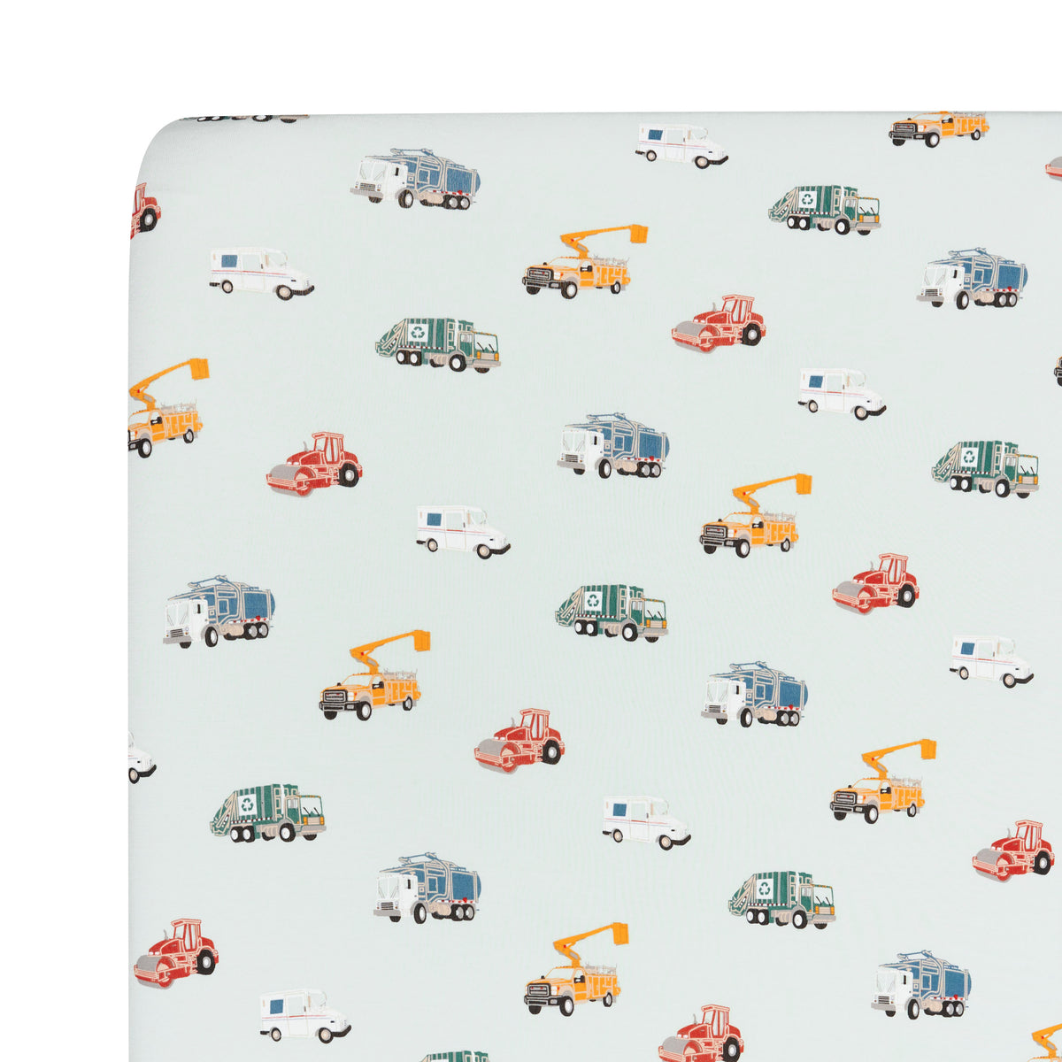 Close up of the Crib Sheet in City Vehicles shown on a crib mattress