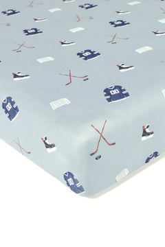 Crib Sheet in Vintage Hockey print on a white background