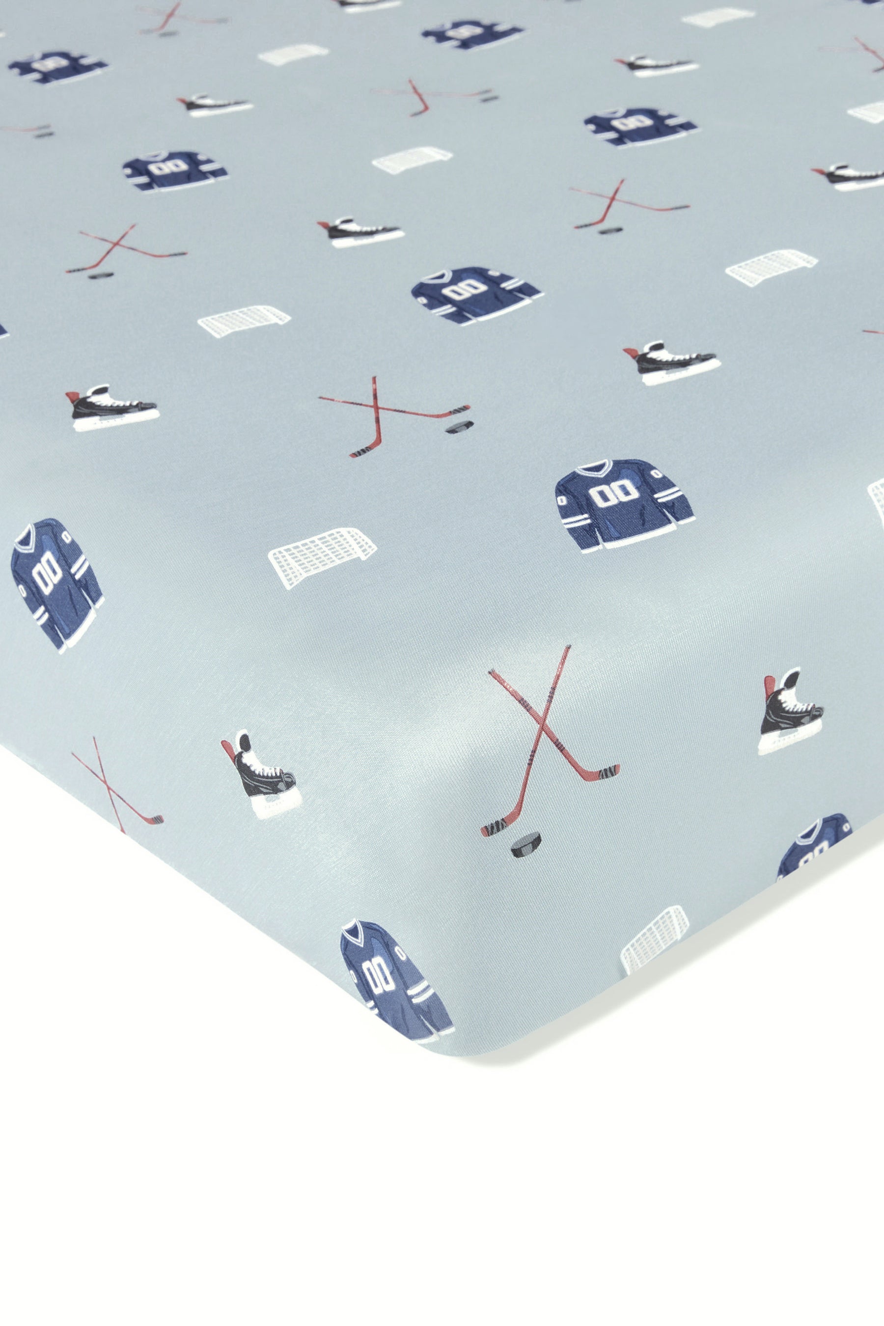 Crib Sheet in Vintage Hockey print on a white background