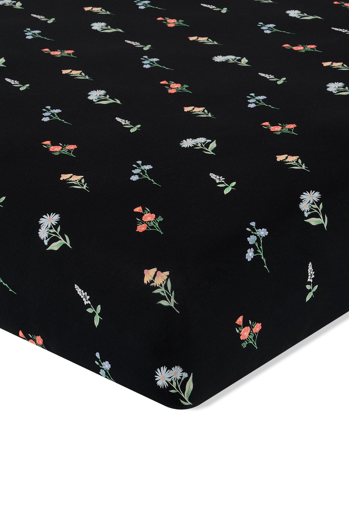 Black Crib Sheet in Wildflower print on a white background