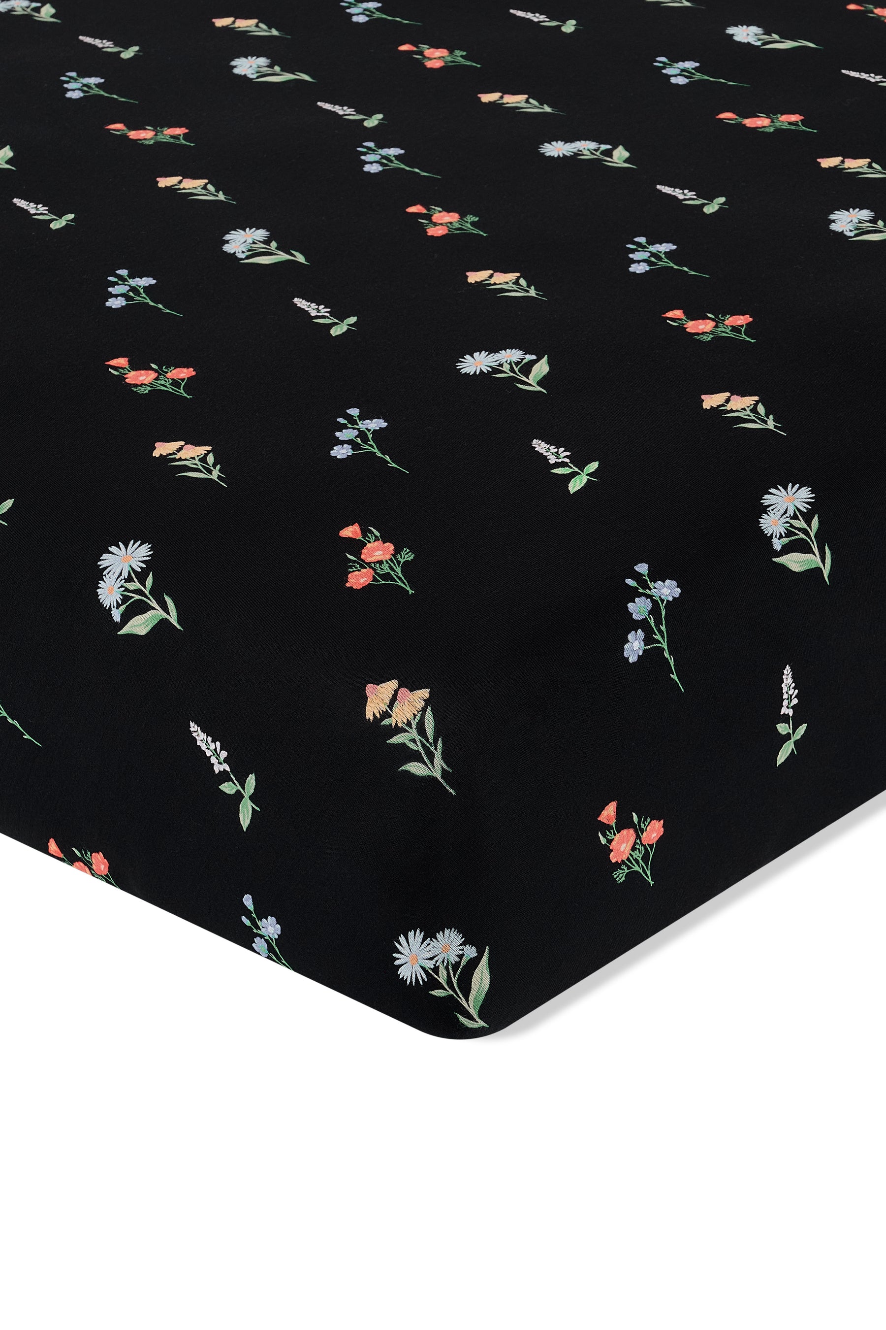 Black Crib Sheet in Wildflower print on a white background