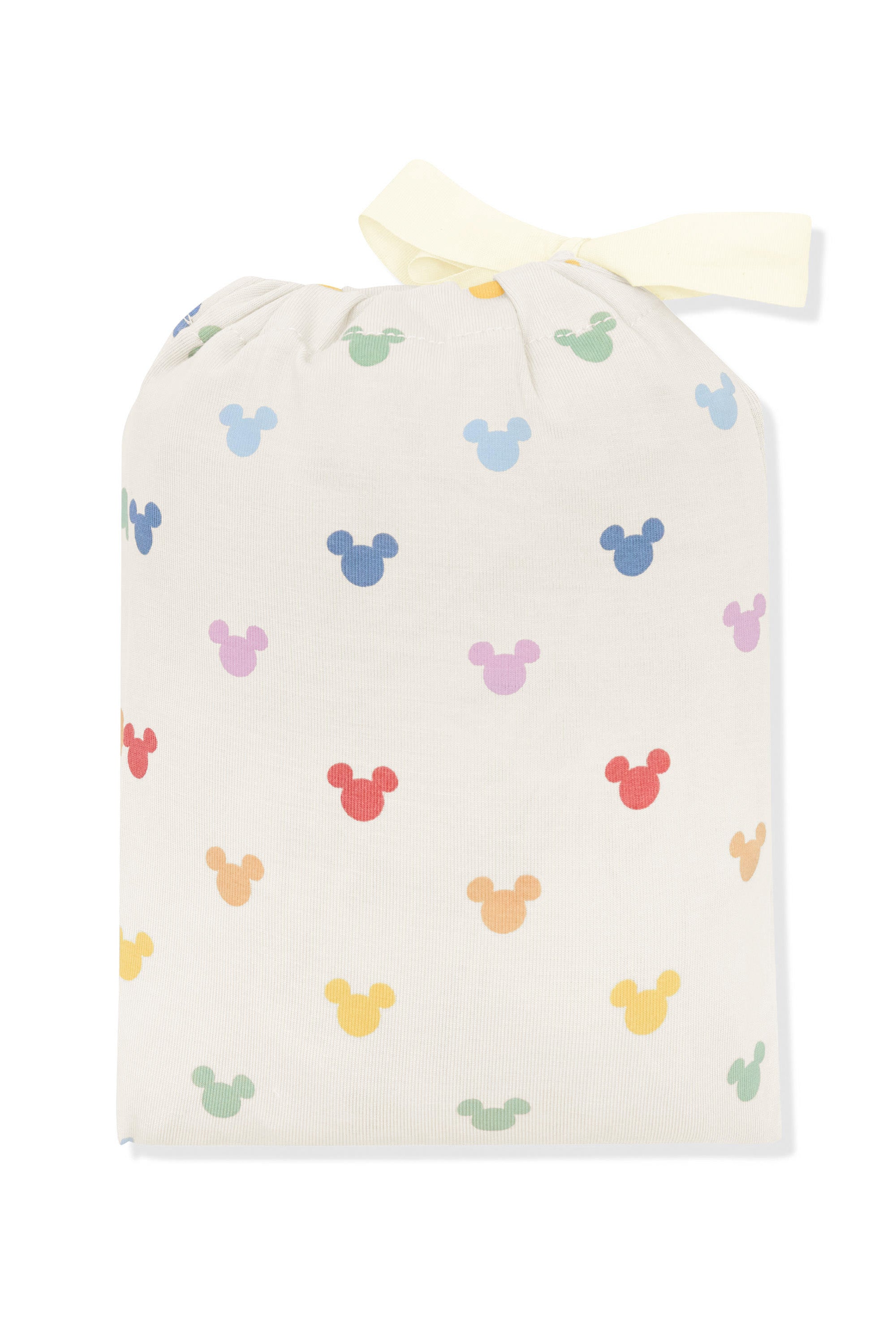 Change pad cover in pastel mickey mouse icons shown in its packaging