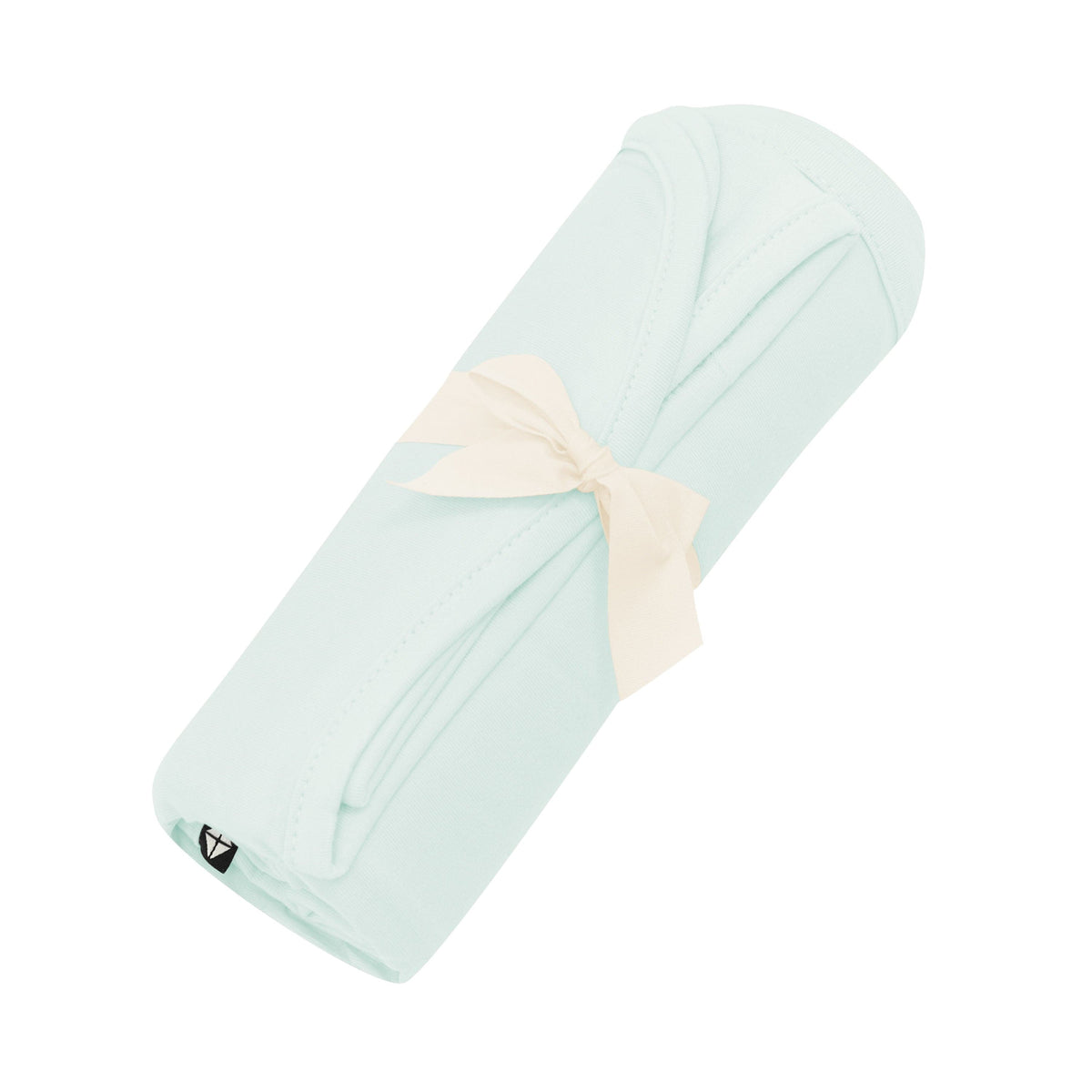 Swaddle Blanket in Dew shown rolled in its packaging