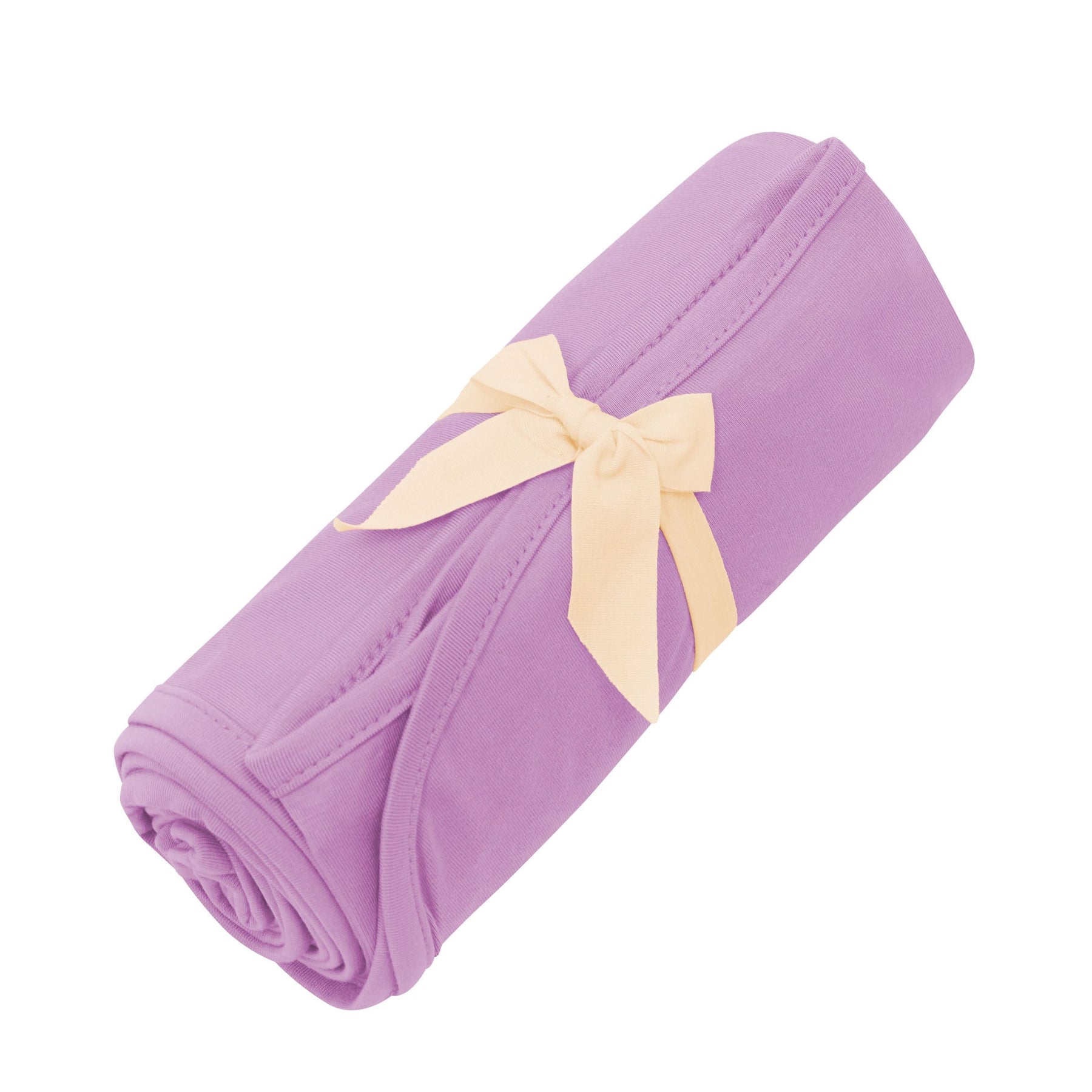 Kyte Baby Swaddle Blanket in Poi tied with bow