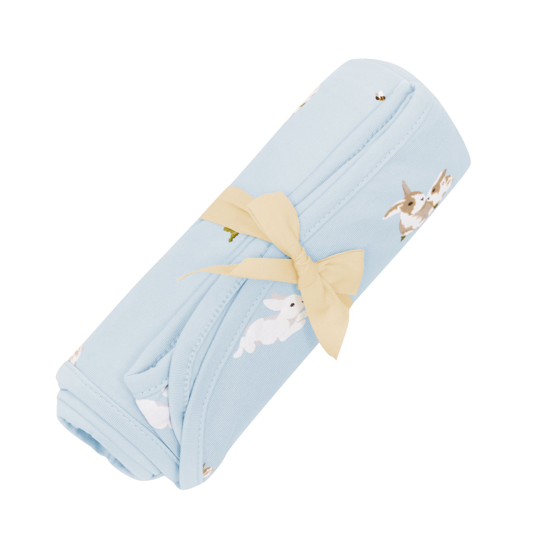 Swaddle Blanket in Ice Rabbit shown wrapped in bow