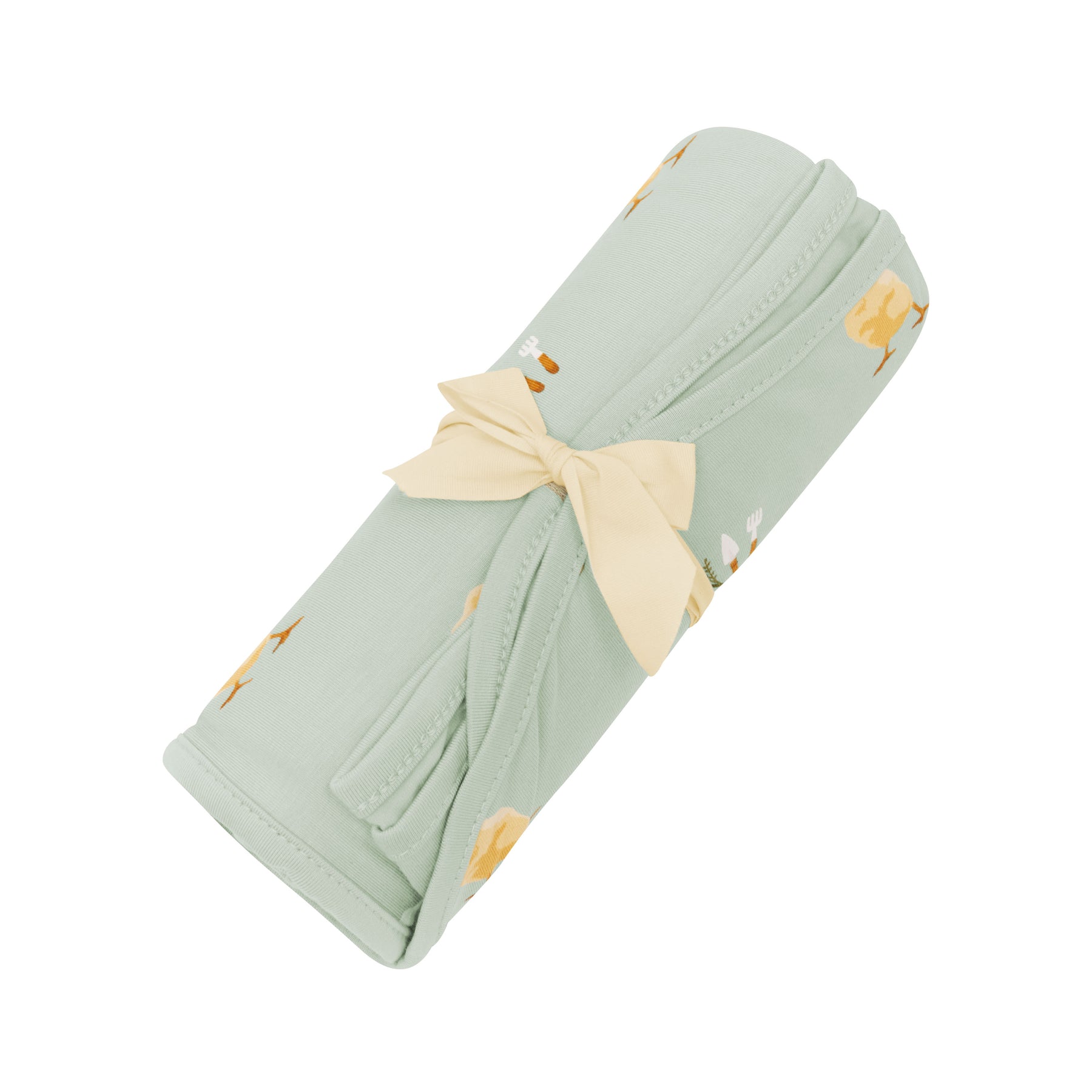 Swaddle Blanket in Aloe Chick shown wrapped in bow