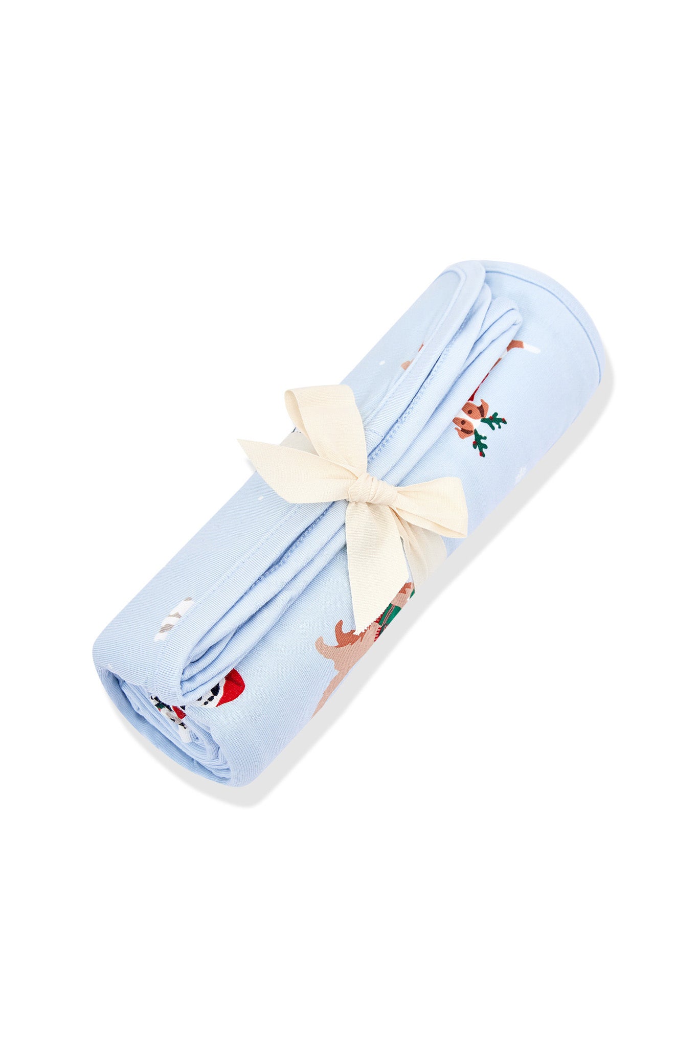 Blue Swaddle Blanket in Holiday Pups print rolled in a ribbon on a white background
