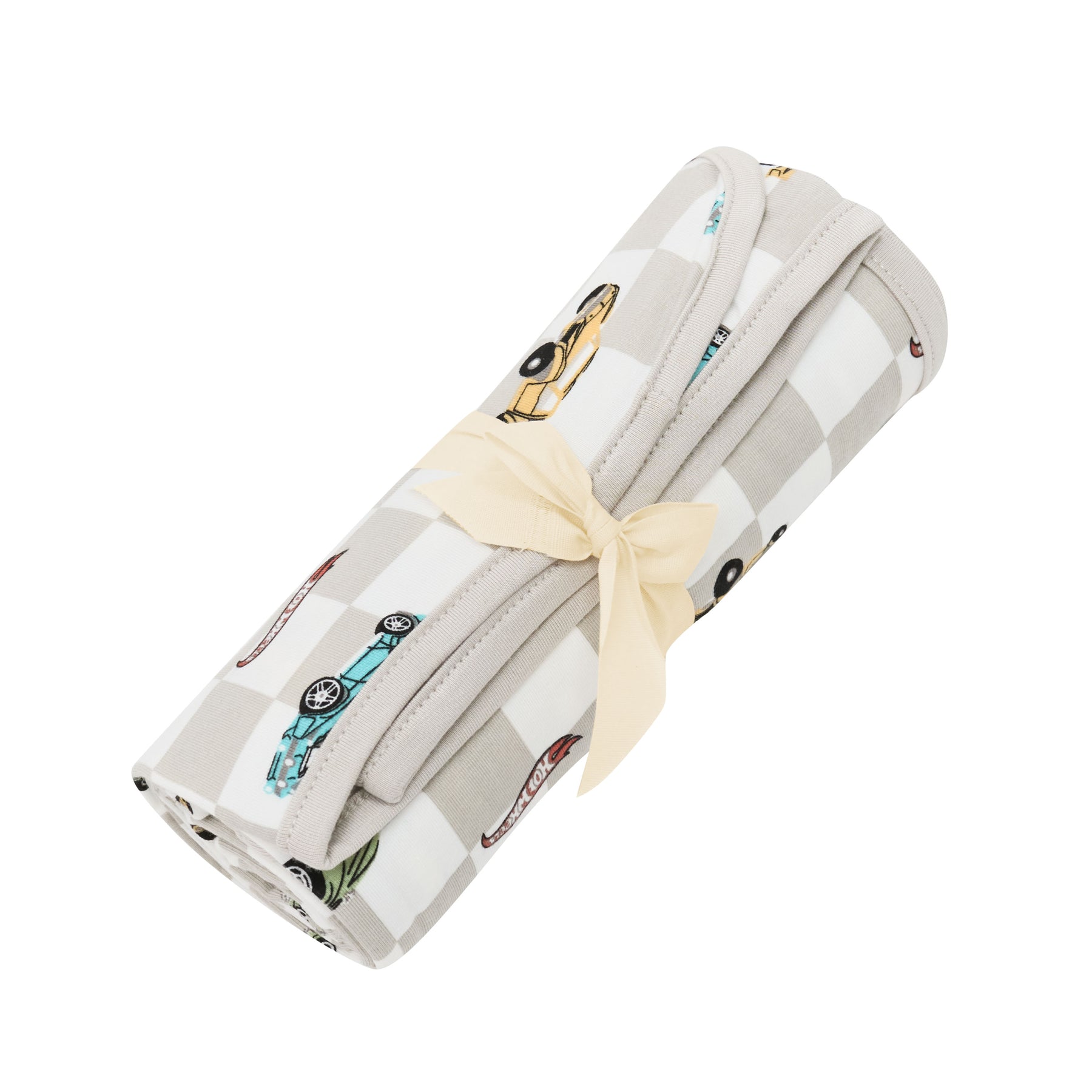 Swaddle Blanket in Fast and Fierce rolled in its packaging