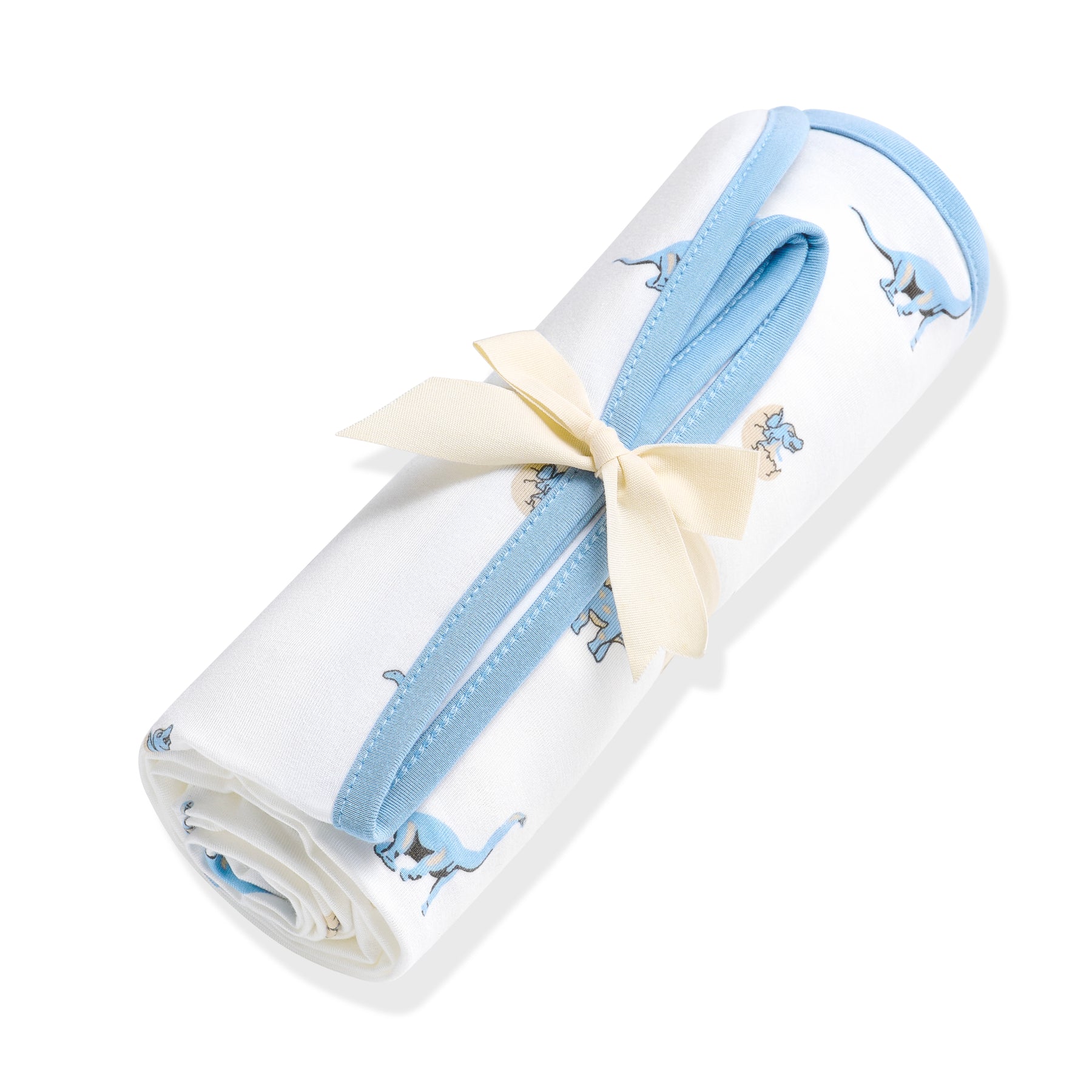 Swaddle Blanket in Jurassic shown rolled in its packaging