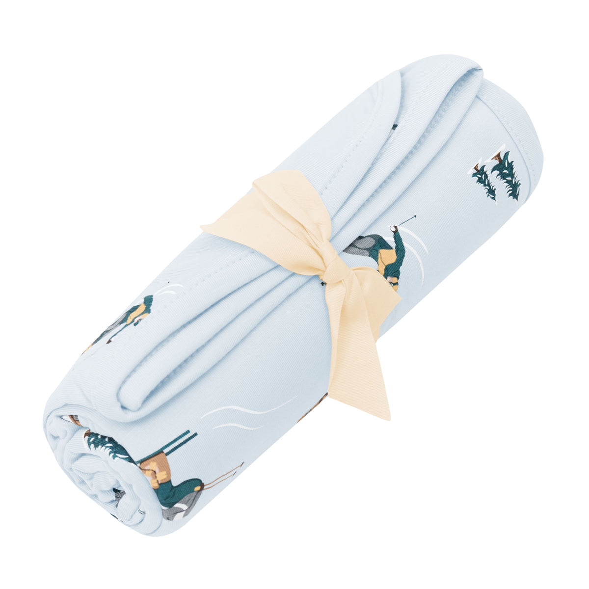 Swaddle Blanket in Ski shown rolled in its packaging