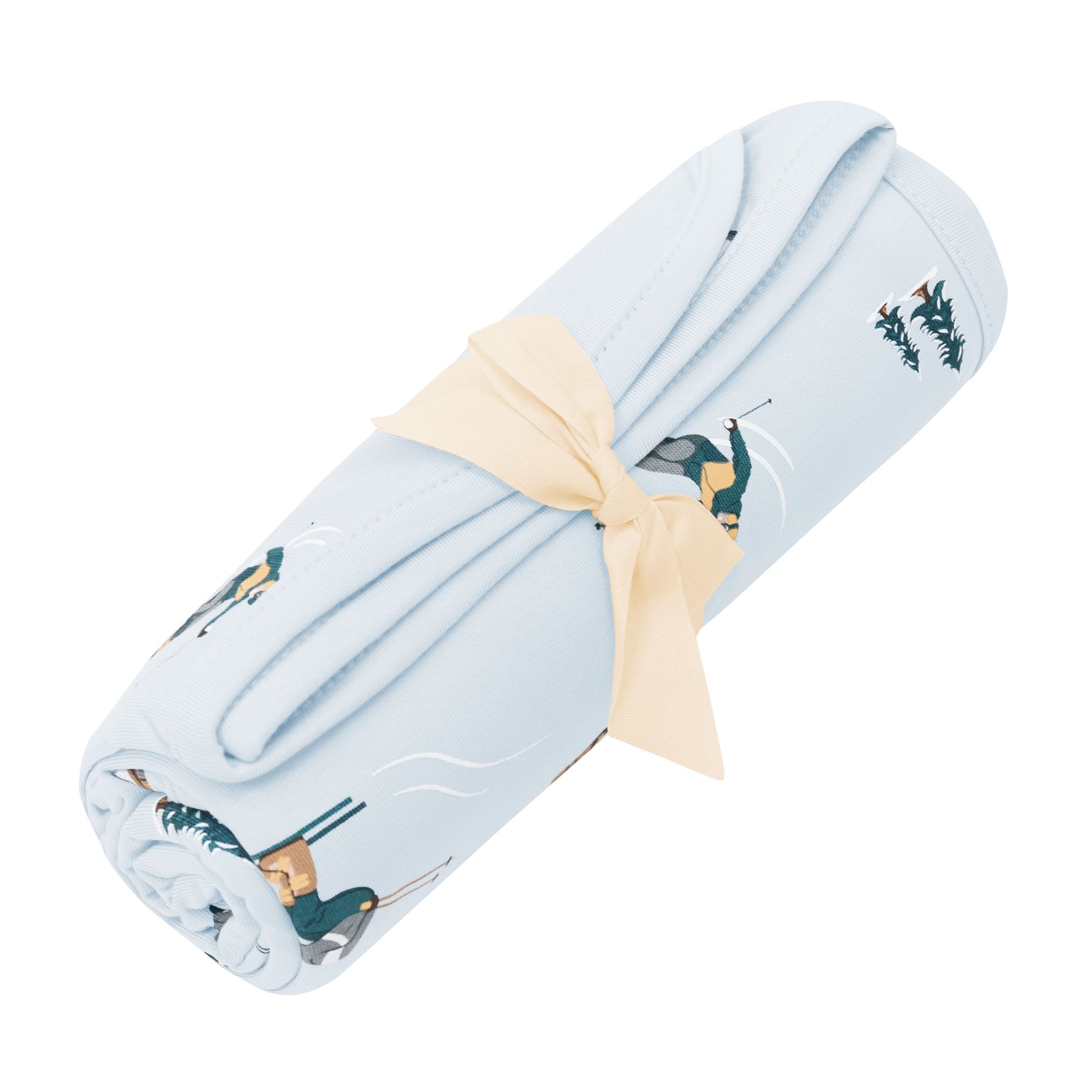 Swaddle Blanket in Ski shown rolled in its packaging