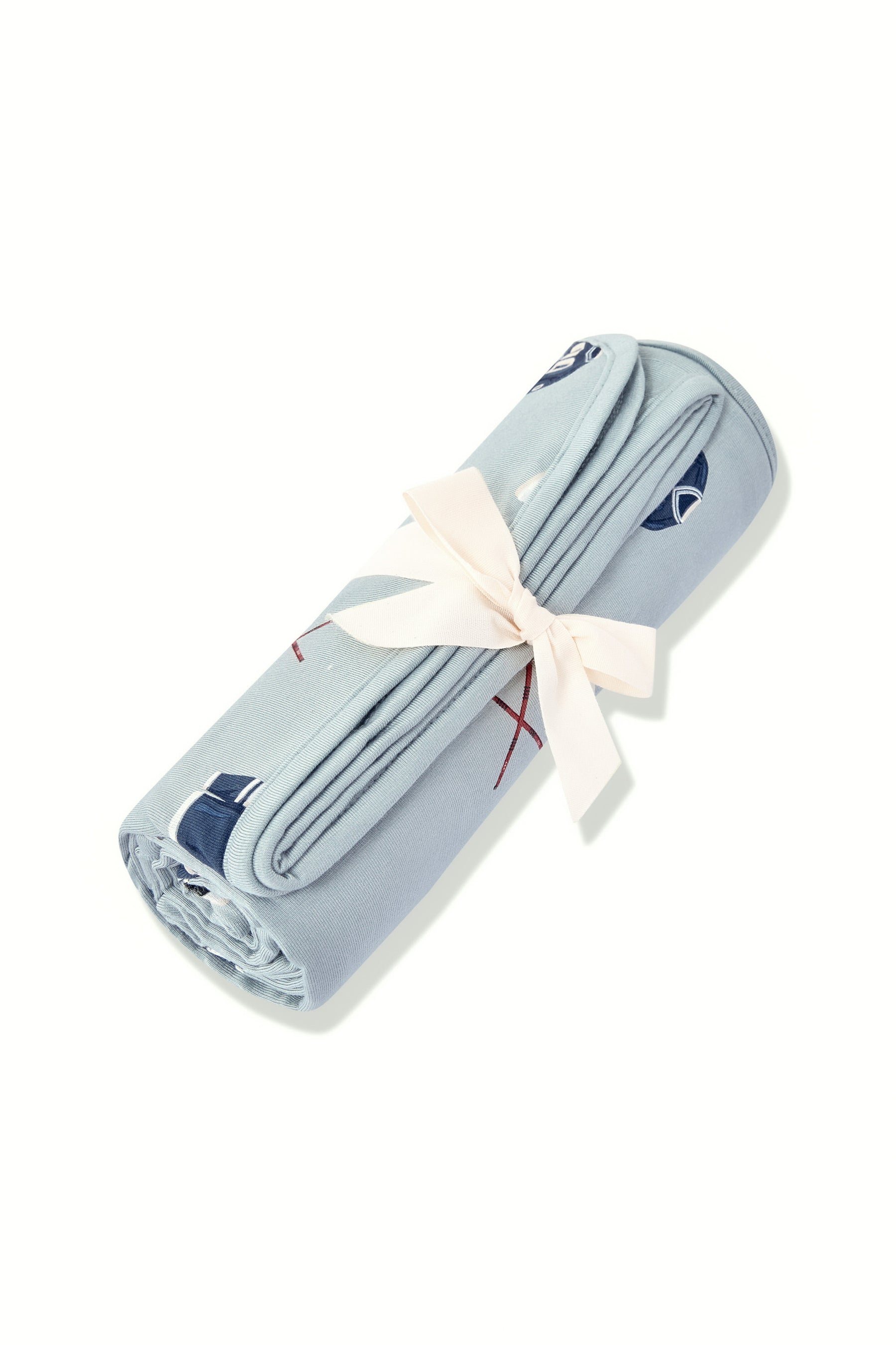 Swaddle Blanket in Vintage Hockey rolled and packed in a ribbon on a white background