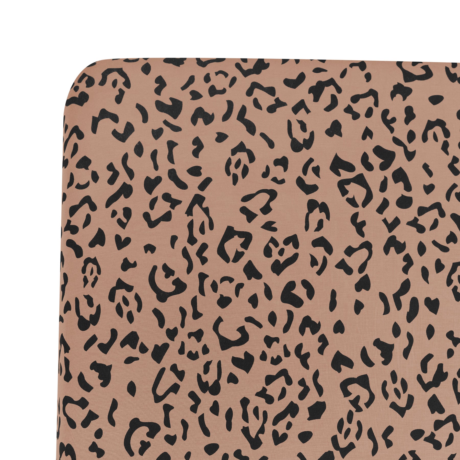 Close up of the Twin Sheet in Latte Leopard on a mattress
