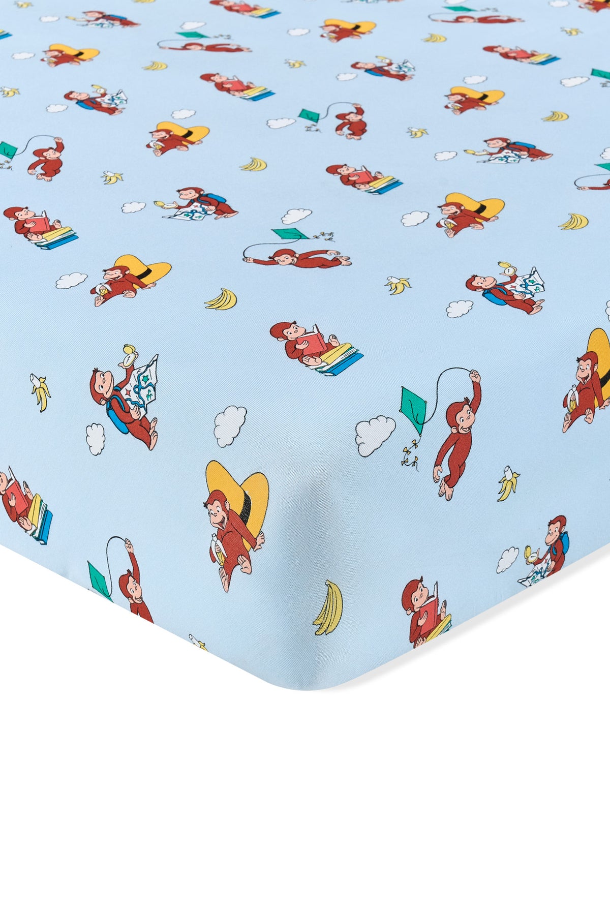 Blue Twin Sheet in Curious George print on a white background