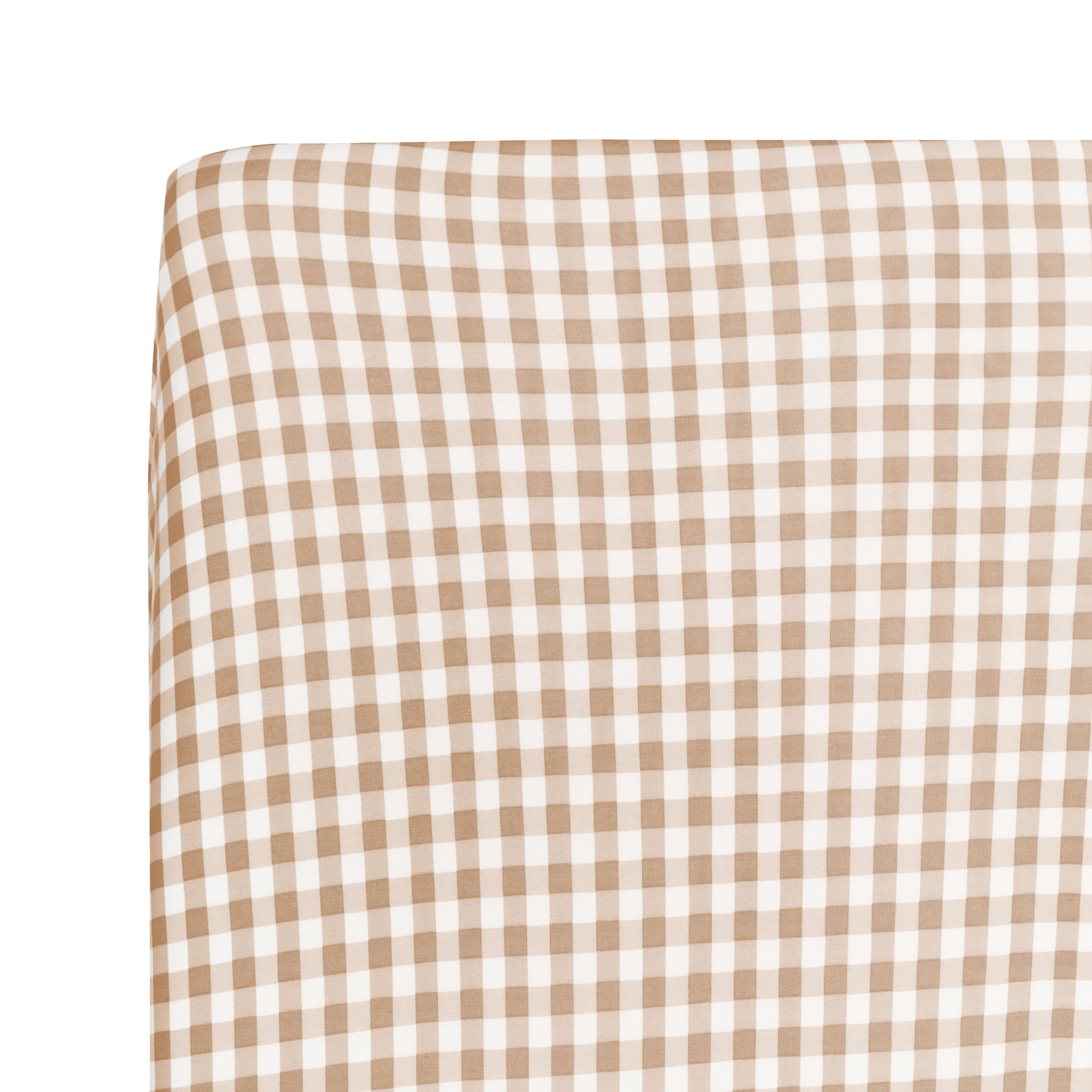 Close up of a corner on the Twin Sheet in Gingham Bisque shown on a mattress