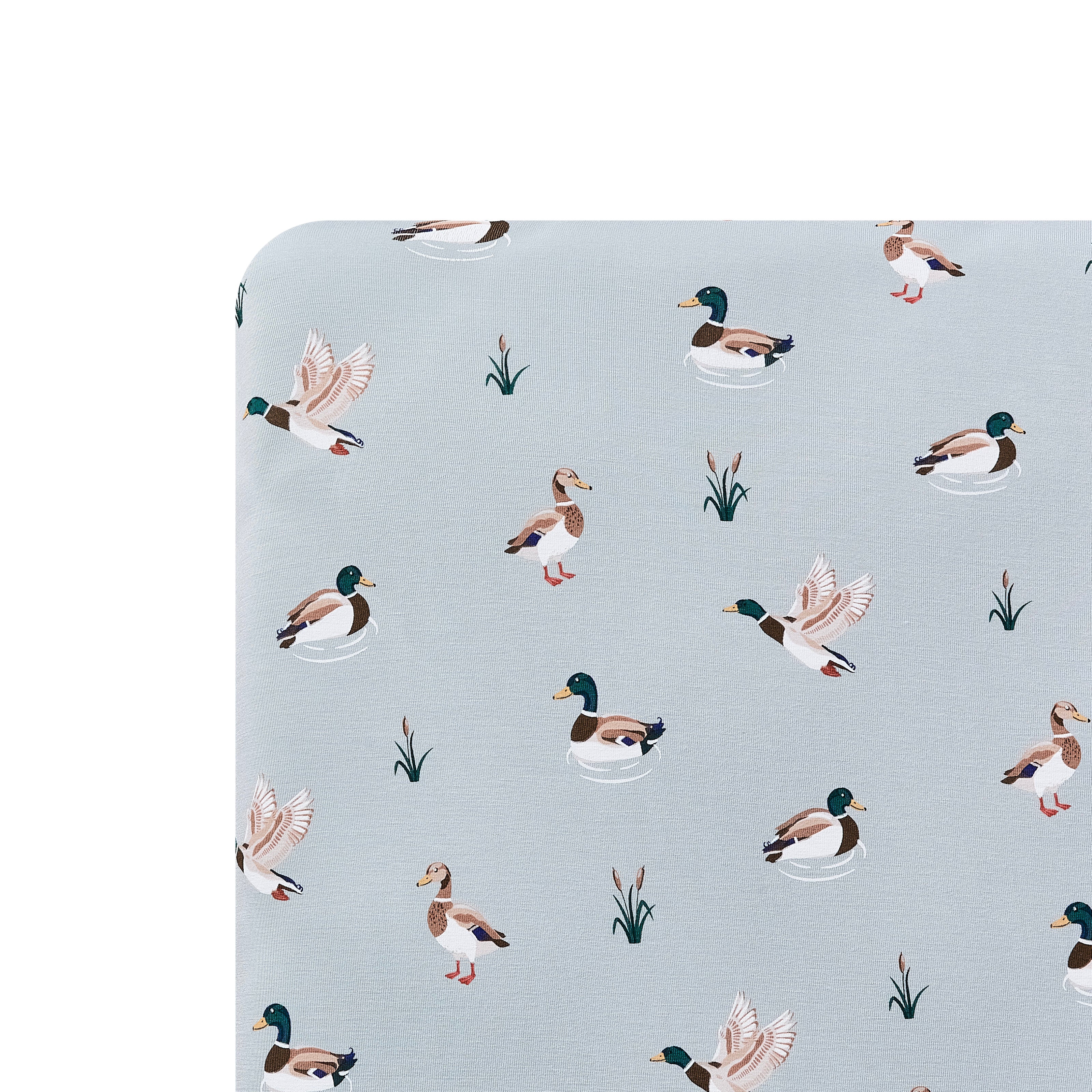 Close up of the Twin Sheet in Mallard Duck shown on a mattress